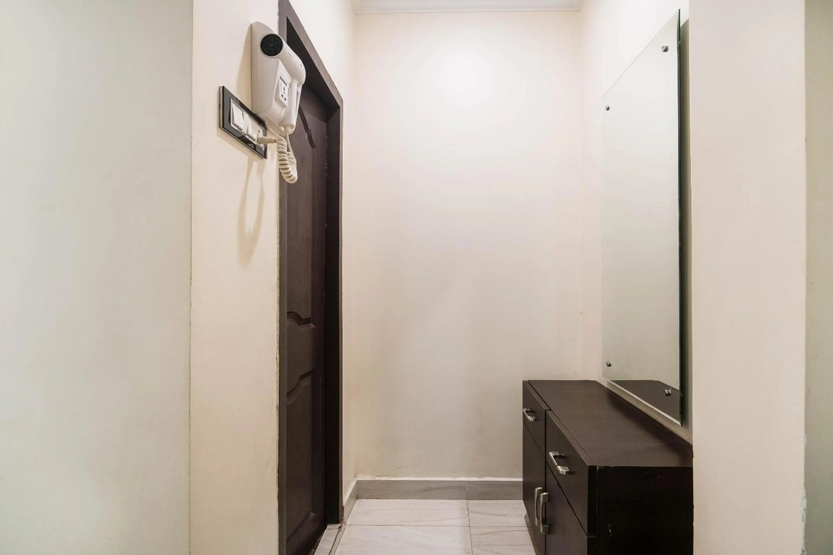 Bedroom in Capital O Aditya Grand