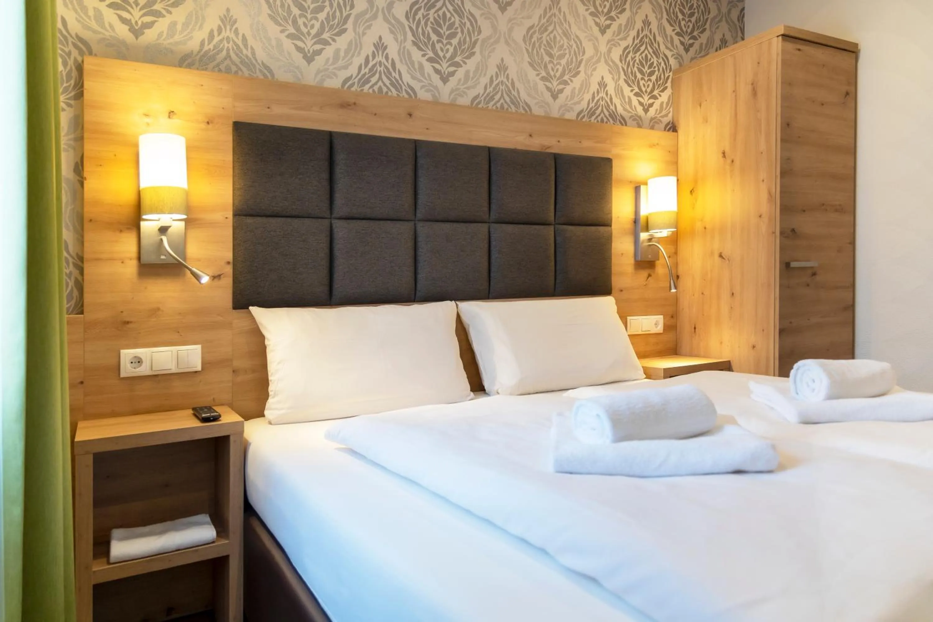 Bed in AKZENT Hotel Restaurant Roter Ochse Rhens bei Koblenz