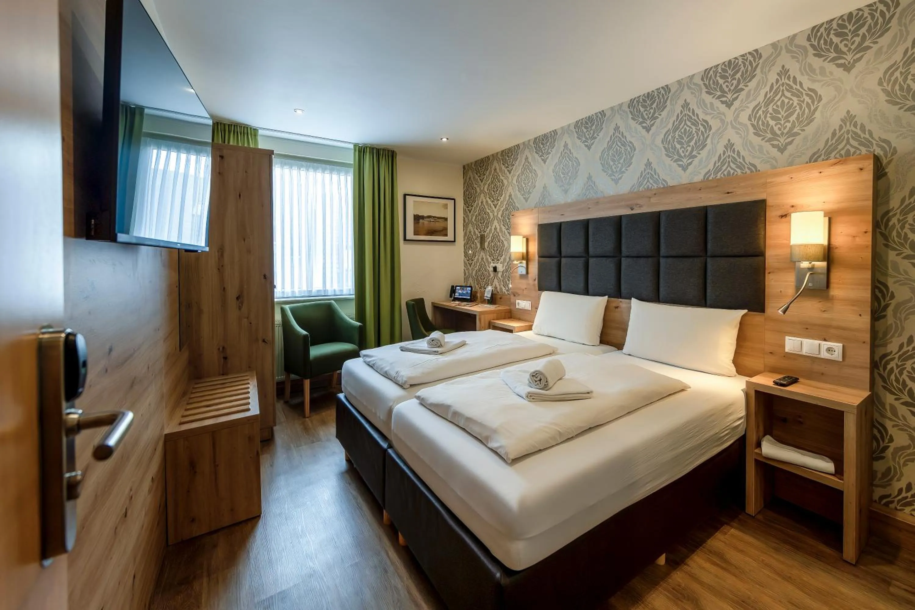 Bed in AKZENT Hotel Restaurant Roter Ochse Rhens bei Koblenz