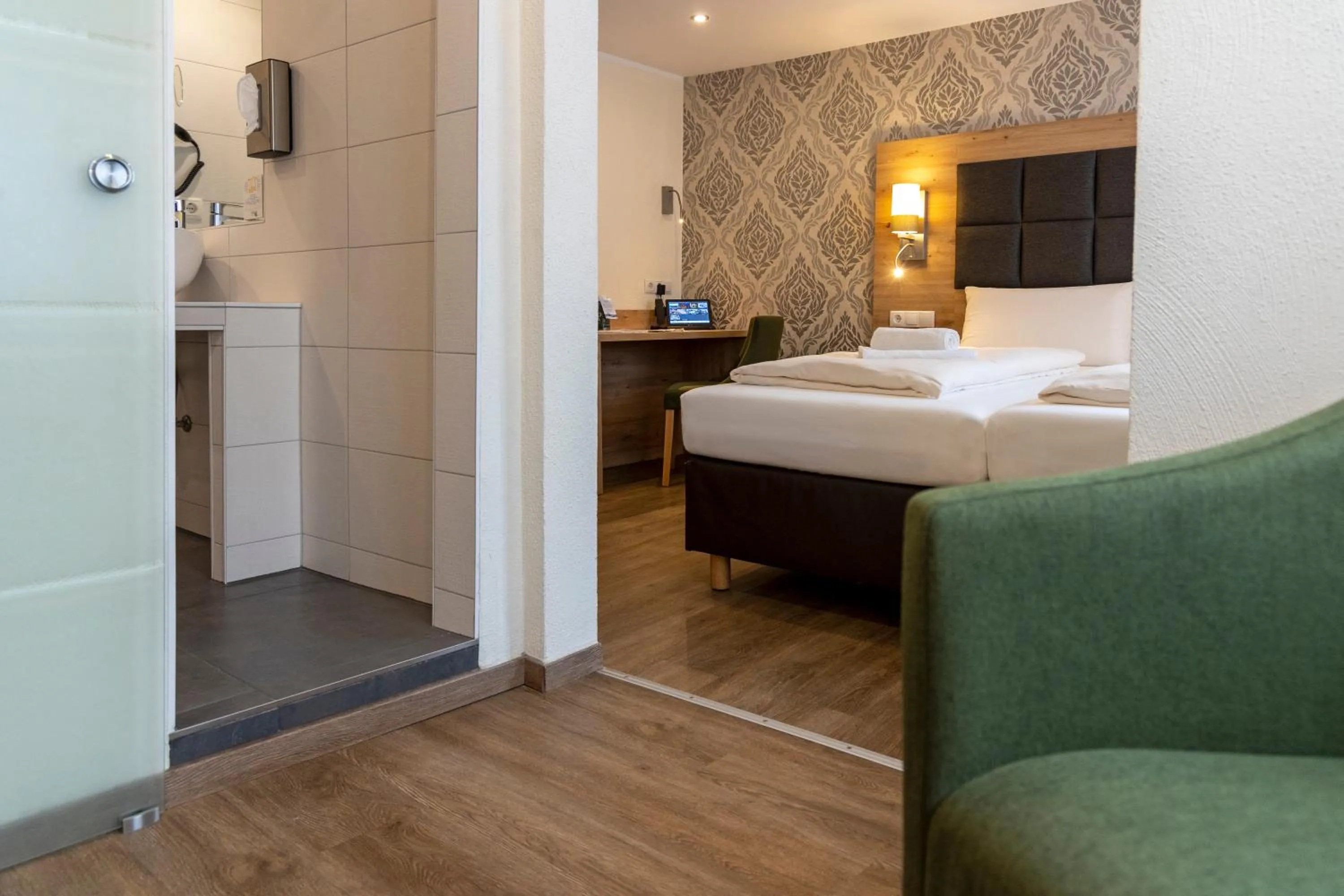 Bed in AKZENT Hotel Restaurant Roter Ochse Rhens bei Koblenz