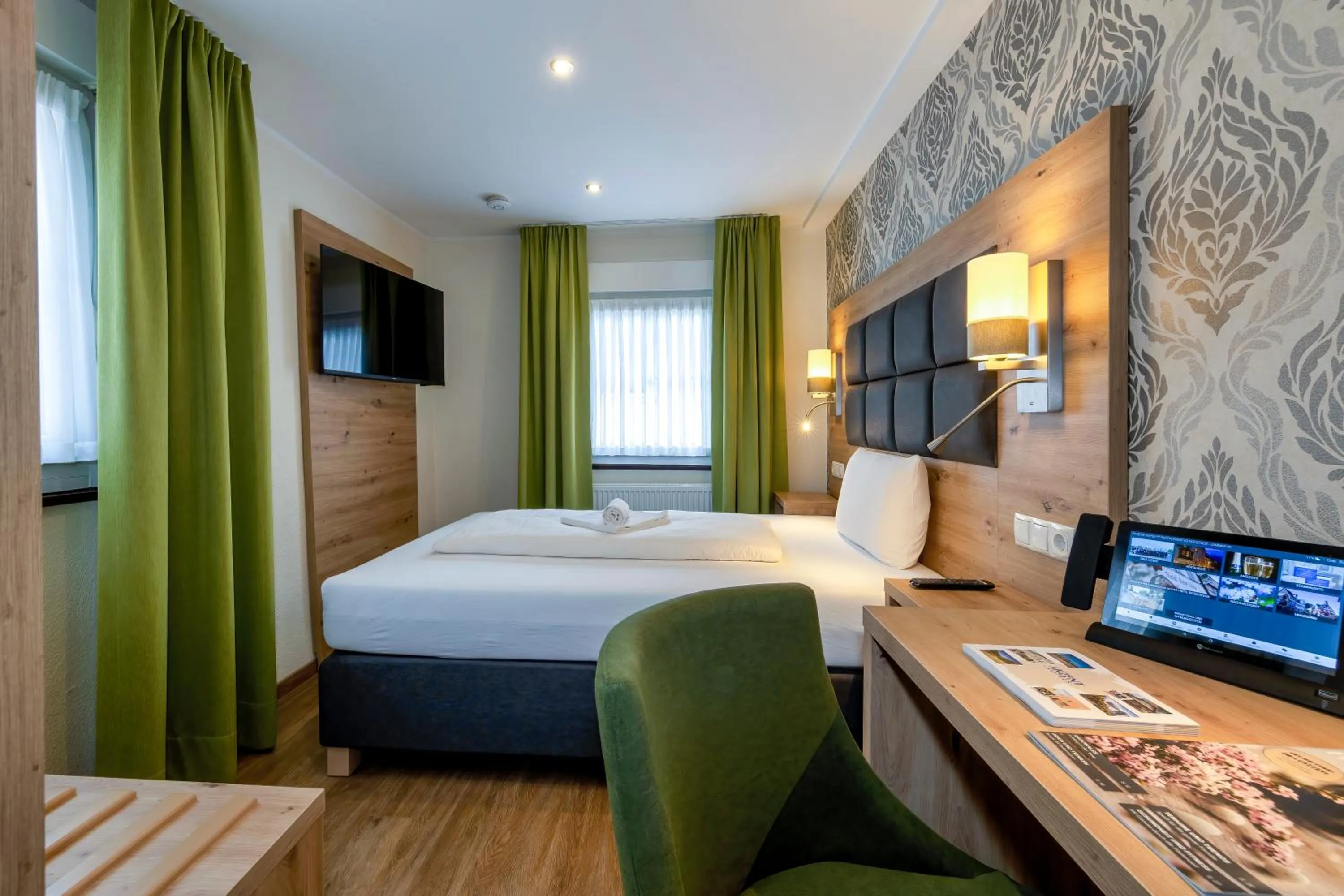 Bed in AKZENT Hotel Restaurant Roter Ochse Rhens bei Koblenz