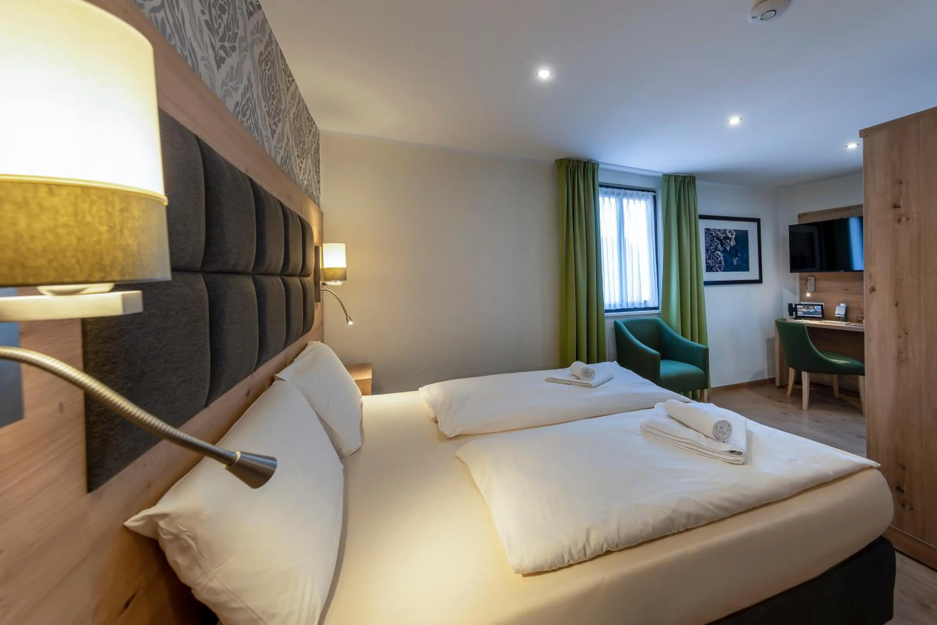 Bed in AKZENT Hotel Restaurant Roter Ochse Rhens bei Koblenz