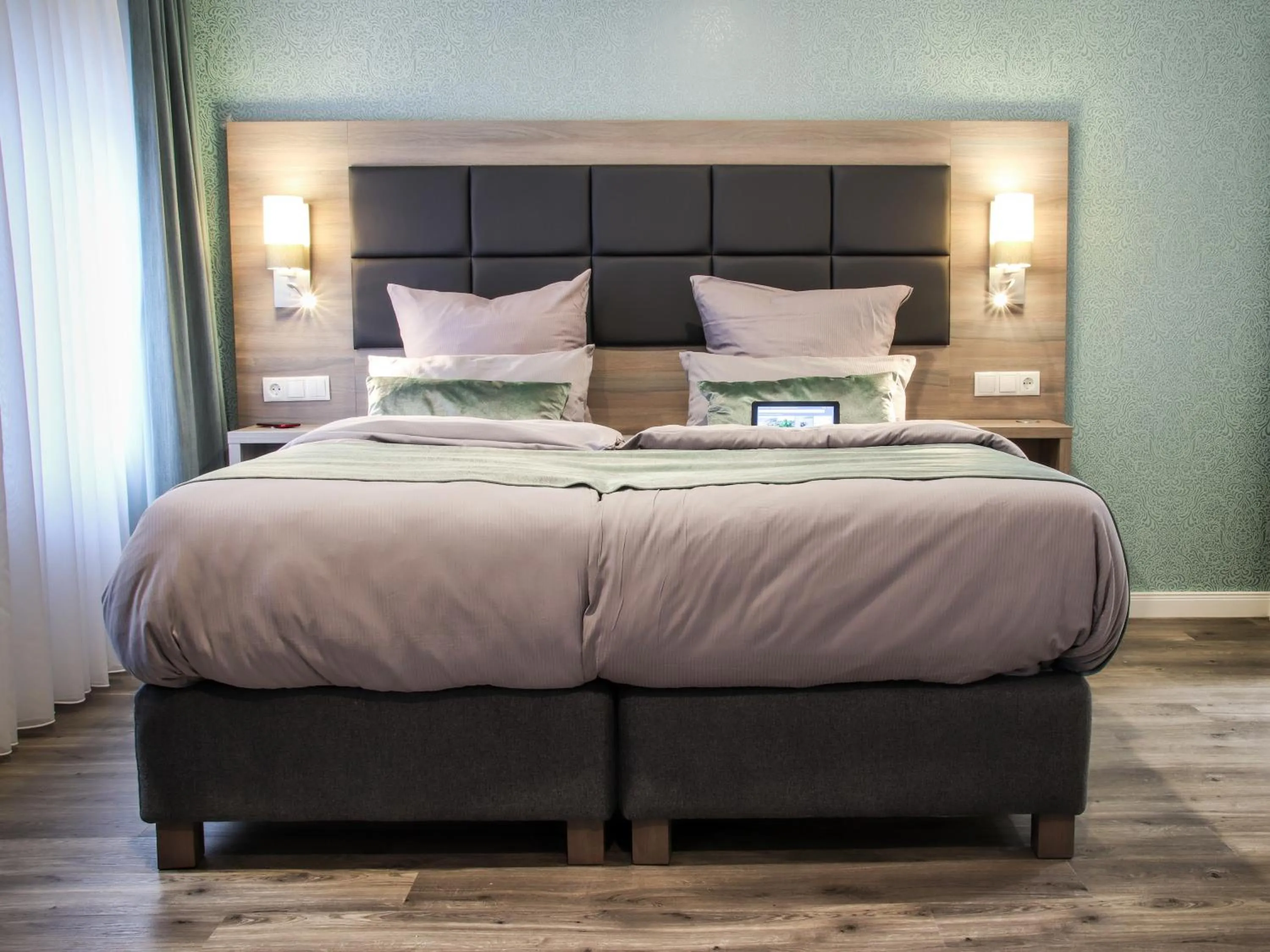 Bed in AKZENT Hotel Restaurant Roter Ochse Rhens bei Koblenz