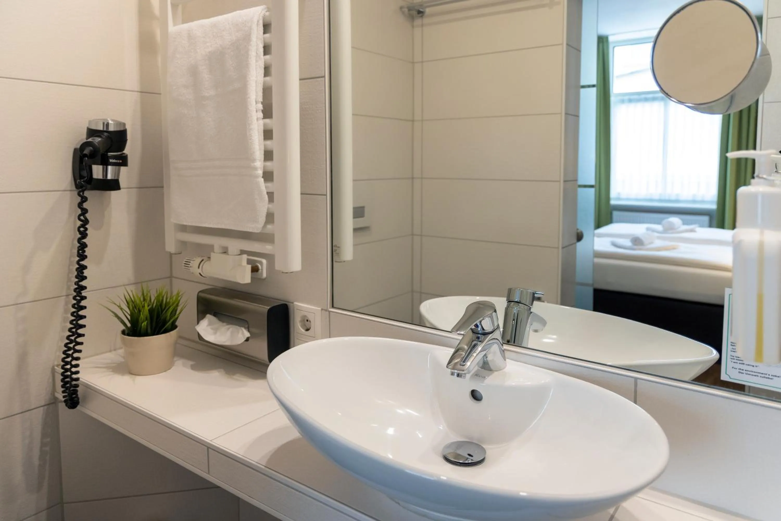 Bed in AKZENT Hotel Restaurant Roter Ochse Rhens bei Koblenz