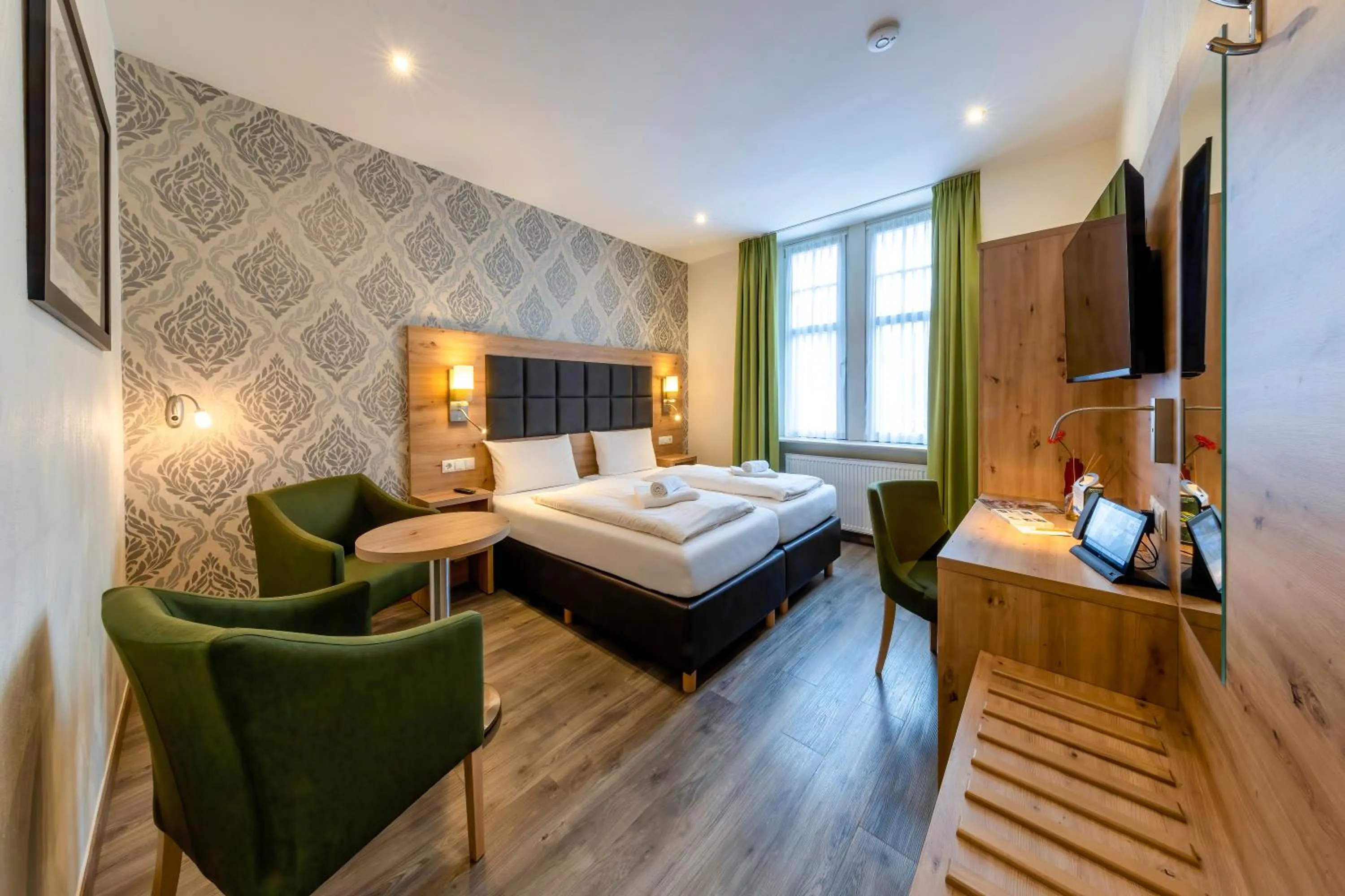 Bed in AKZENT Hotel Restaurant Roter Ochse Rhens bei Koblenz