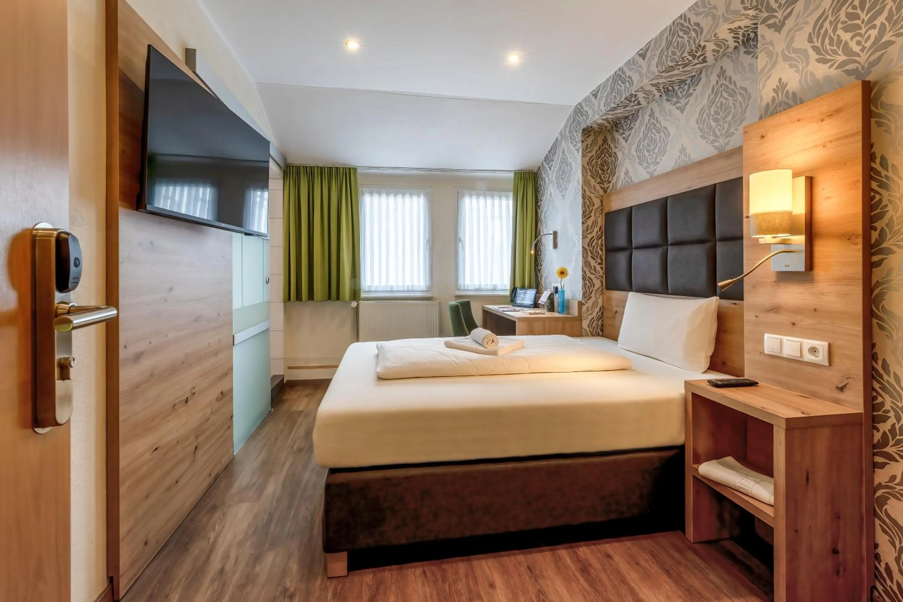 Bed in AKZENT Hotel Restaurant Roter Ochse Rhens bei Koblenz