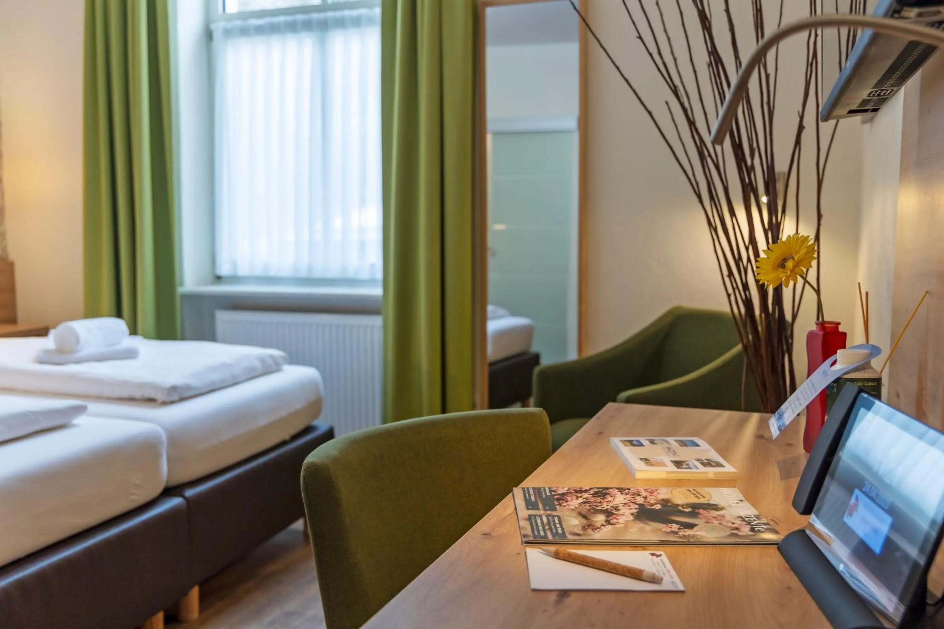 Bed in AKZENT Hotel Restaurant Roter Ochse Rhens bei Koblenz