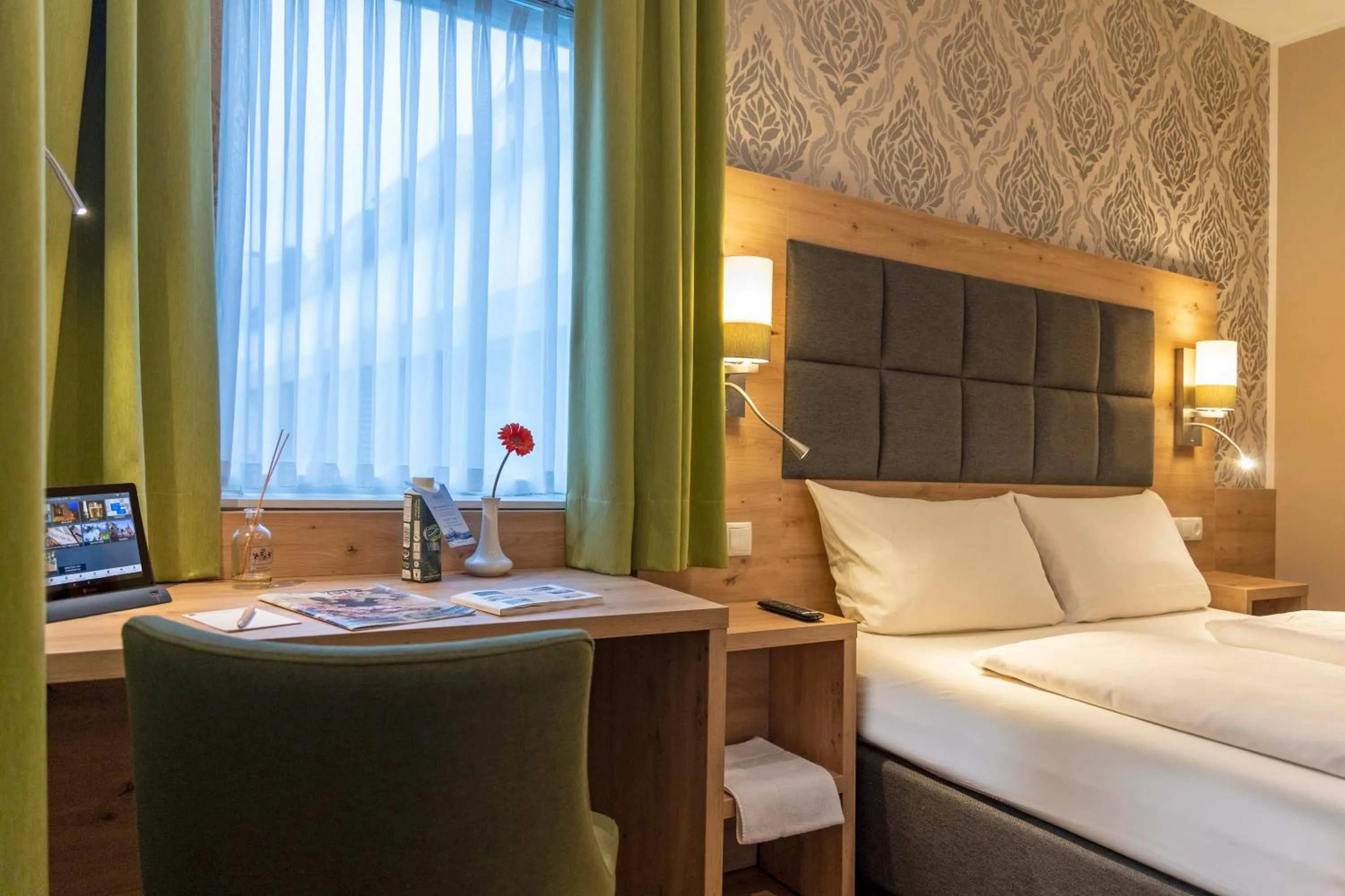 Bed in AKZENT Hotel Restaurant Roter Ochse Rhens bei Koblenz