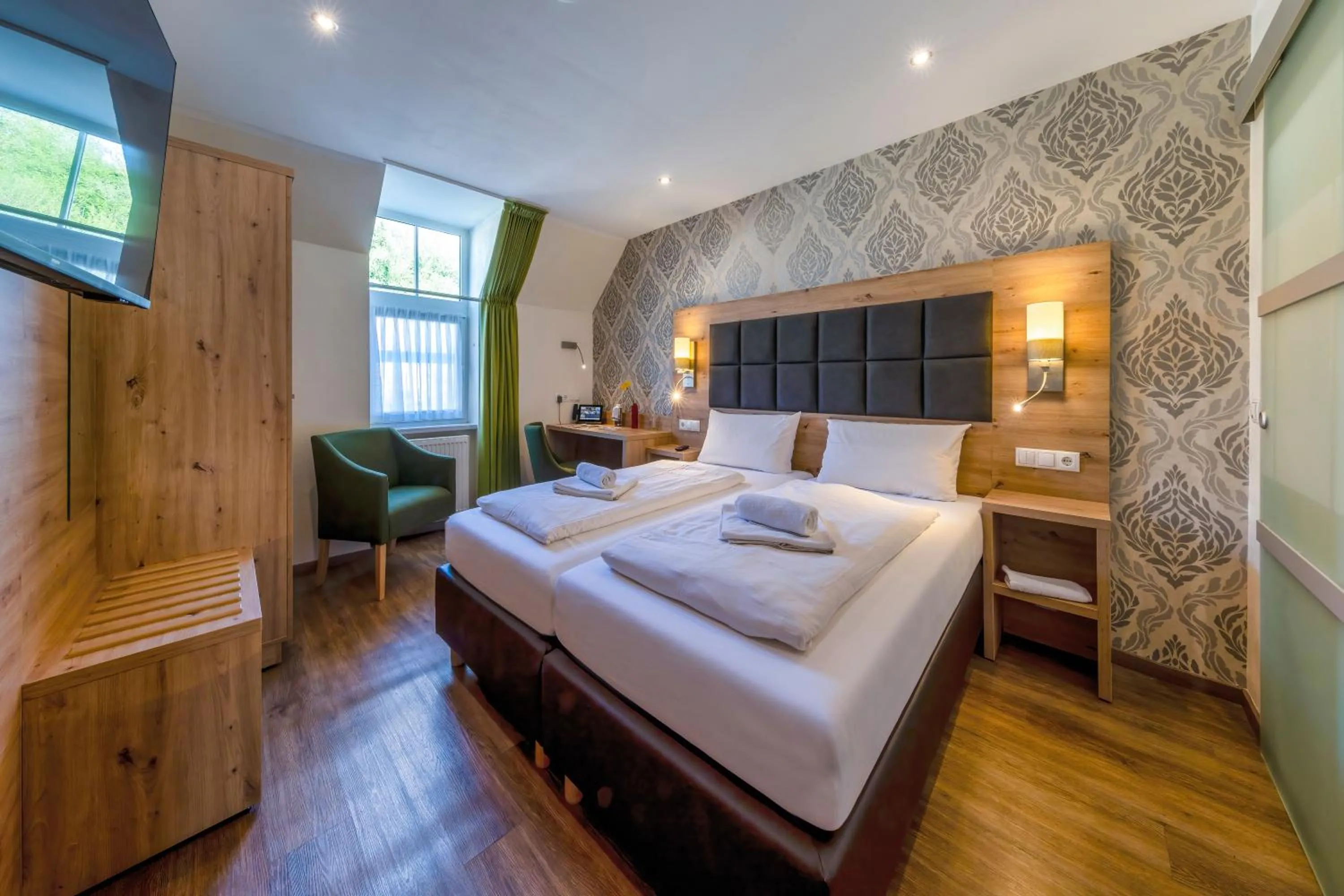 Bed in AKZENT Hotel Restaurant Roter Ochse Rhens bei Koblenz