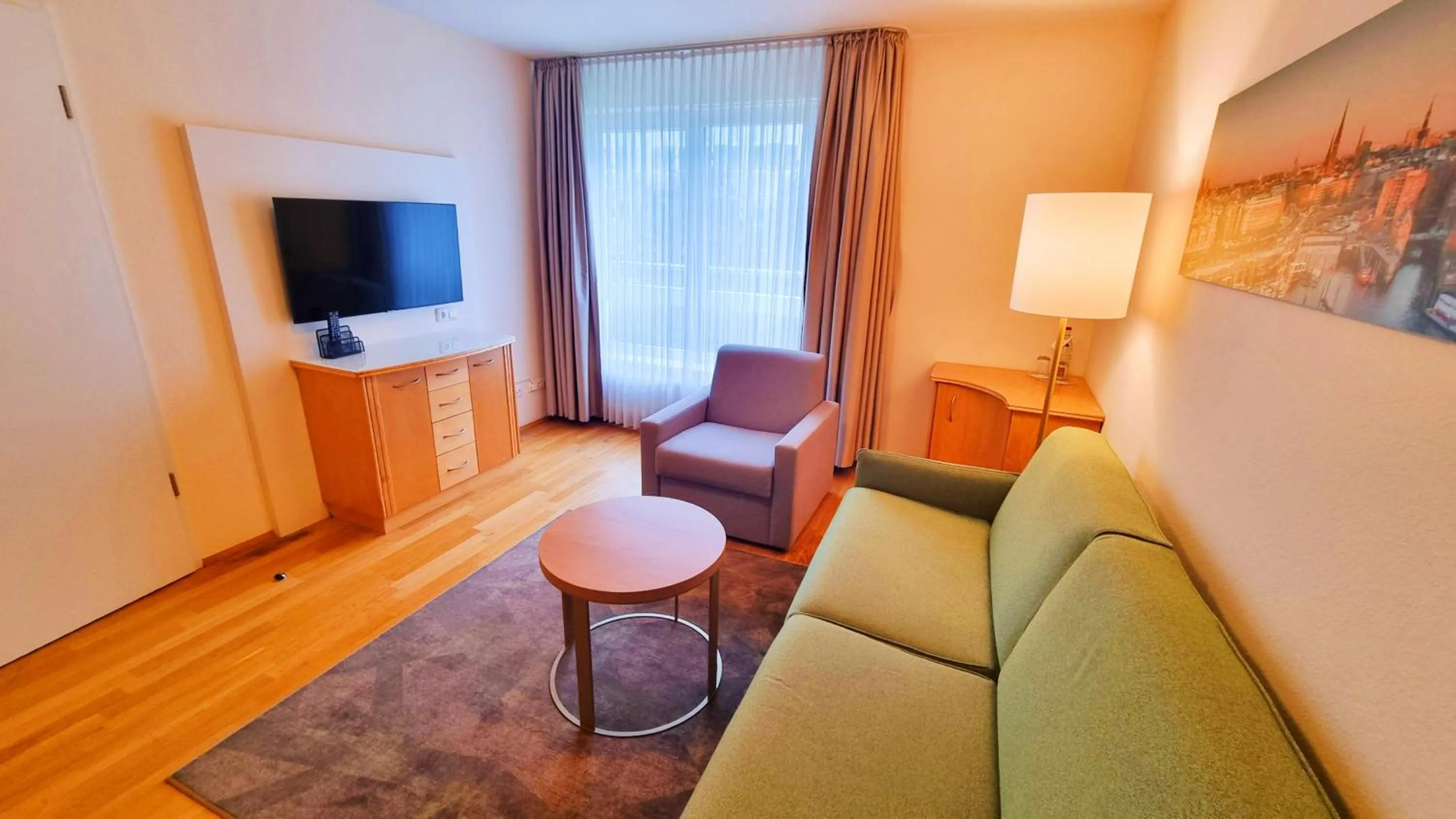 Photo of the whole room in New Living Home Residenzhotel Hamburg