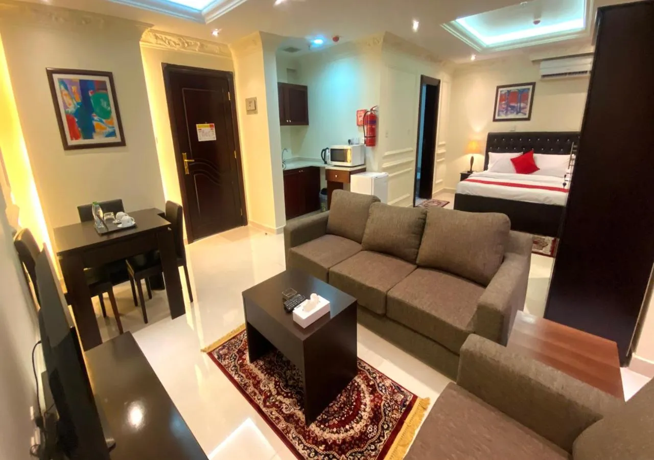 Living room, Bed in Majestic Hotel