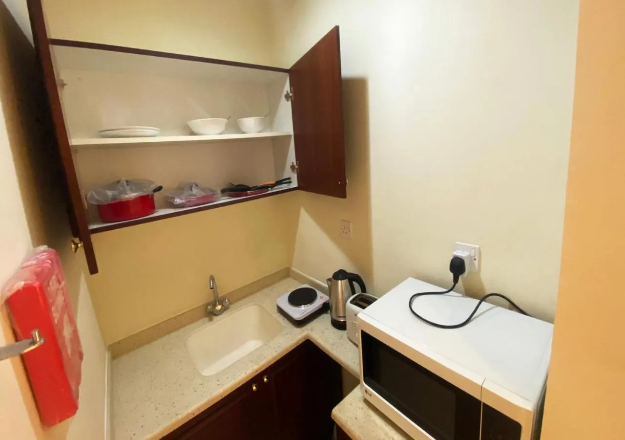 Kitchen or kitchenette in Majestic Hotel