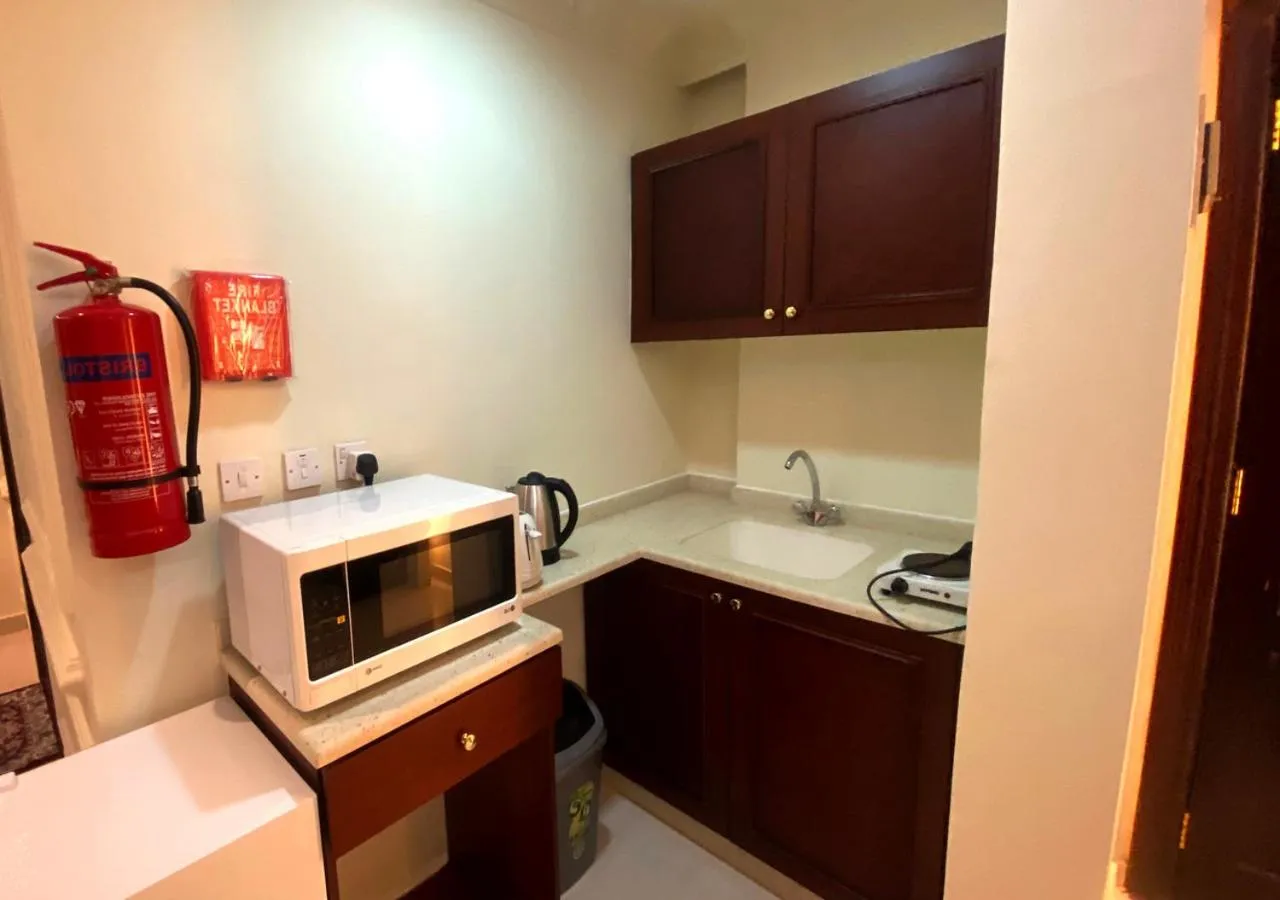 Kitchen or kitchenette in Majestic Hotel