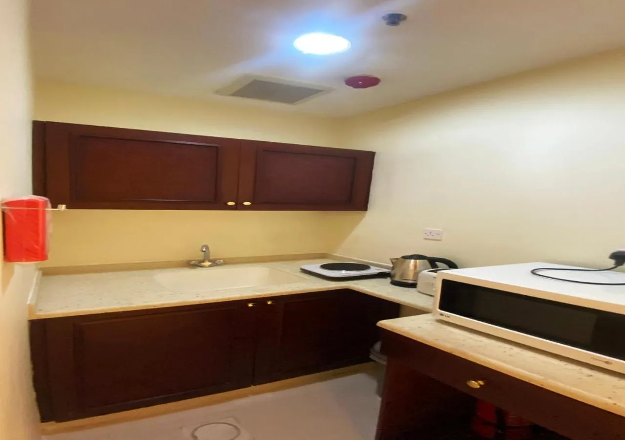 Kitchen or kitchenette in Majestic Hotel