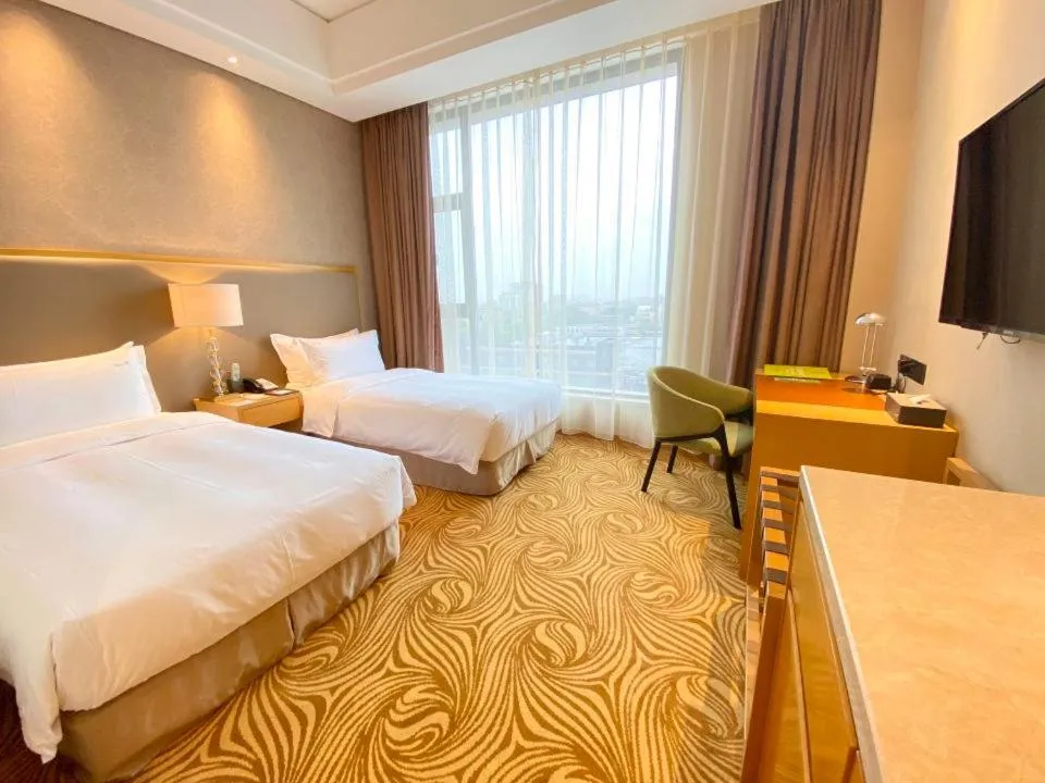 Bed in Holiday Inn Foshan Nanhai Central by IHG