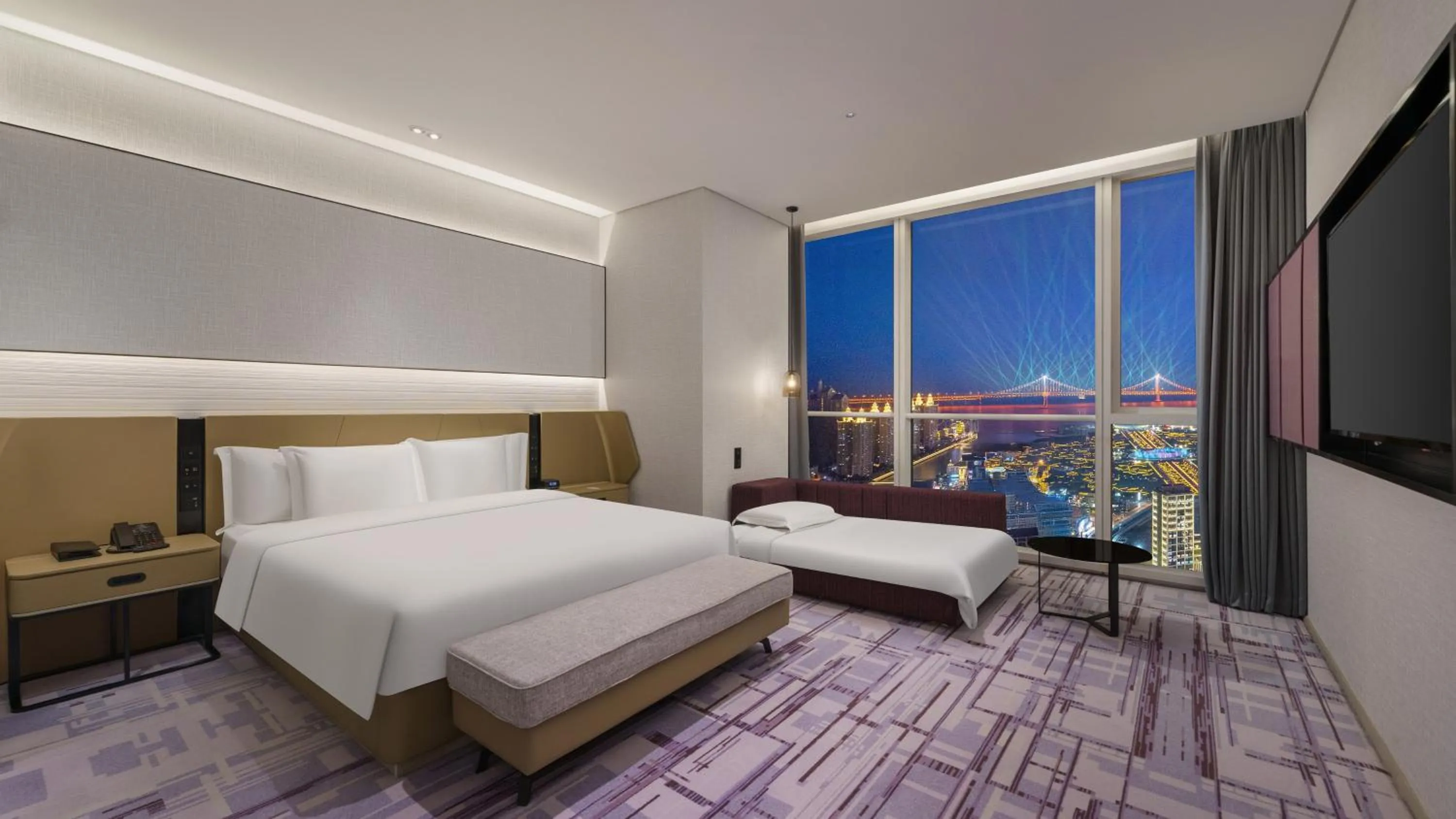 Photo of the whole room, Bed in Crowne Plaza Dalian Xinghai by IHG