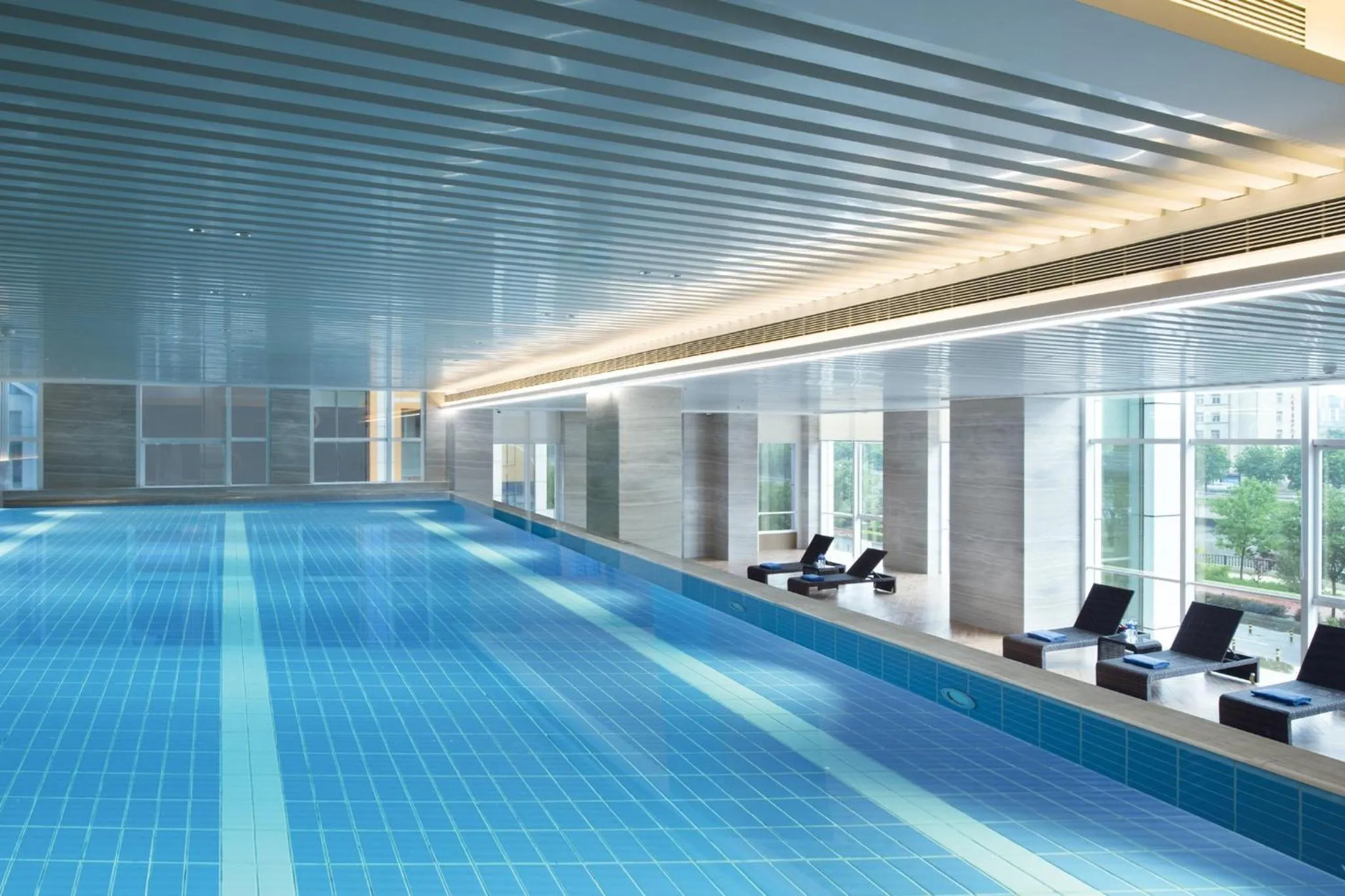 Swimming pool in Crowne Plaza Dalian Xinghai by IHG