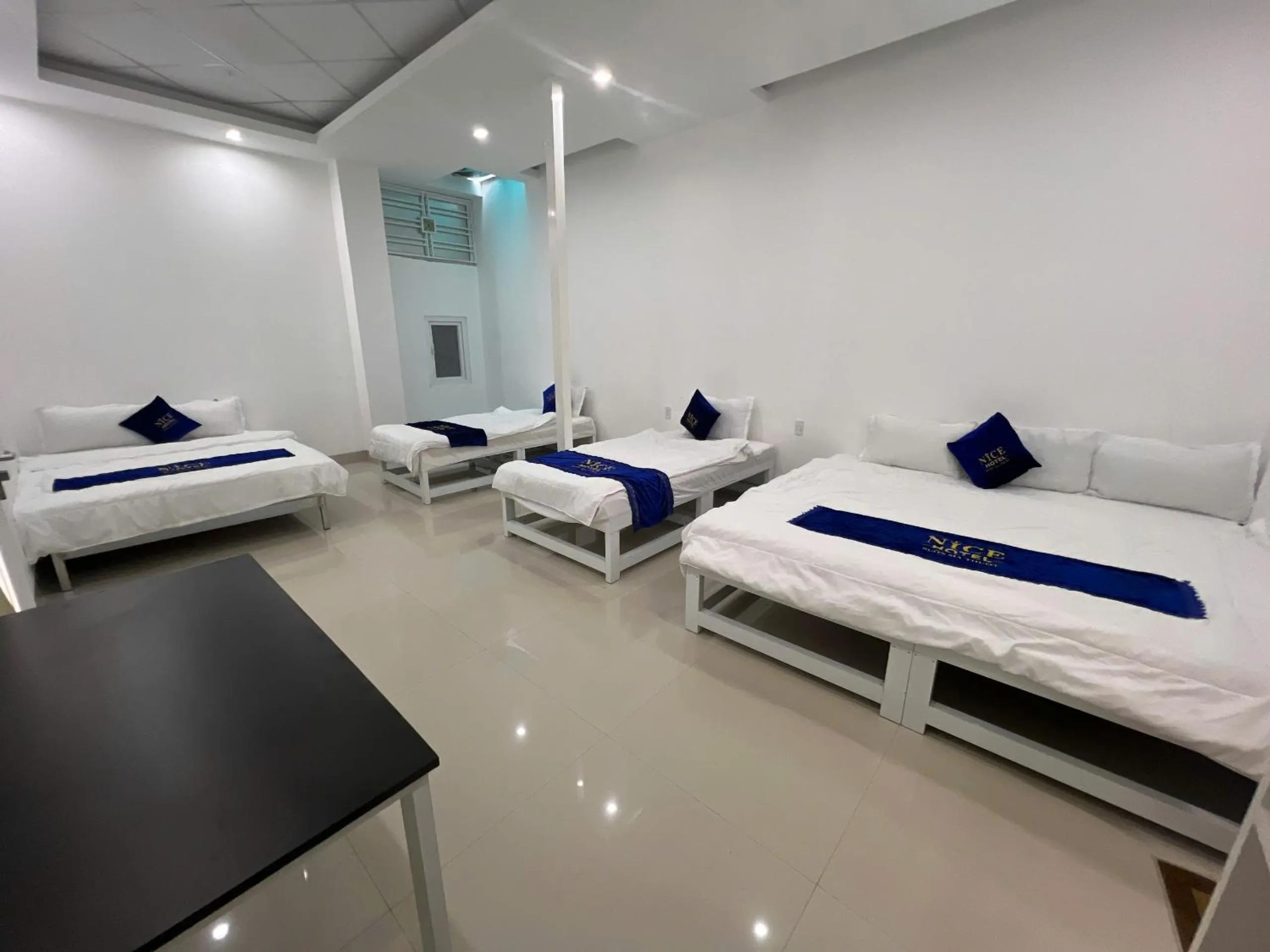 Photo of the whole room, Bed in Nice Hotel Buôn Ma Thuột