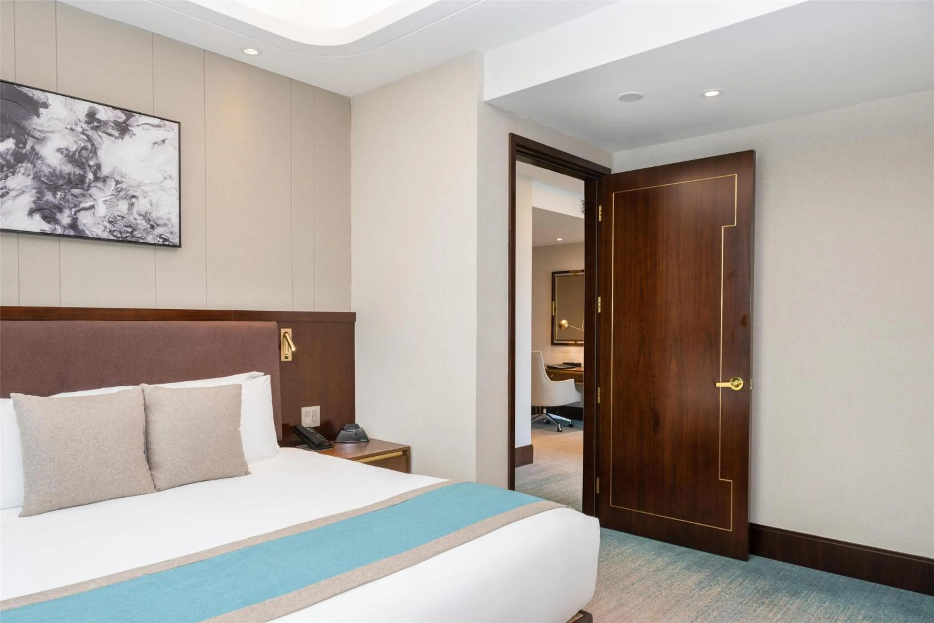 Bed in Blossom Hotel Houston, Curio Collection by Hilton