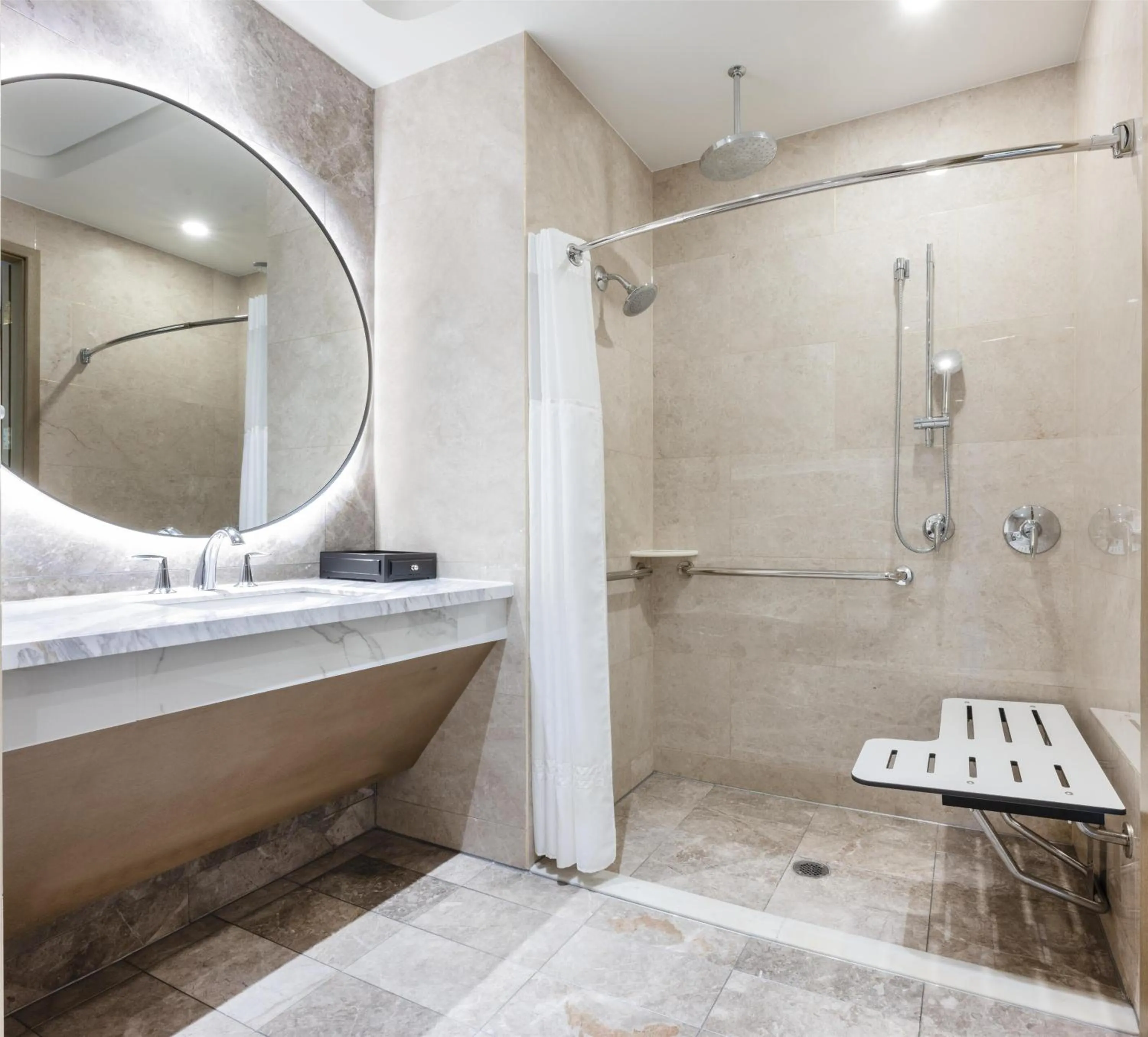 Bathroom in Blossom Hotel Houston, Curio Collection by Hilton