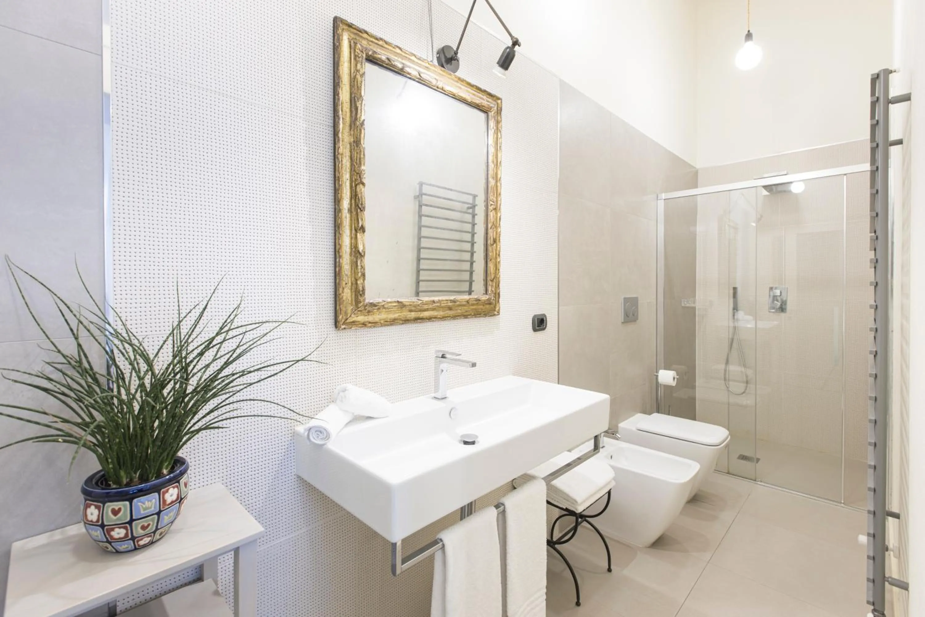 Communal lounge/ TV room in Villa Trisano