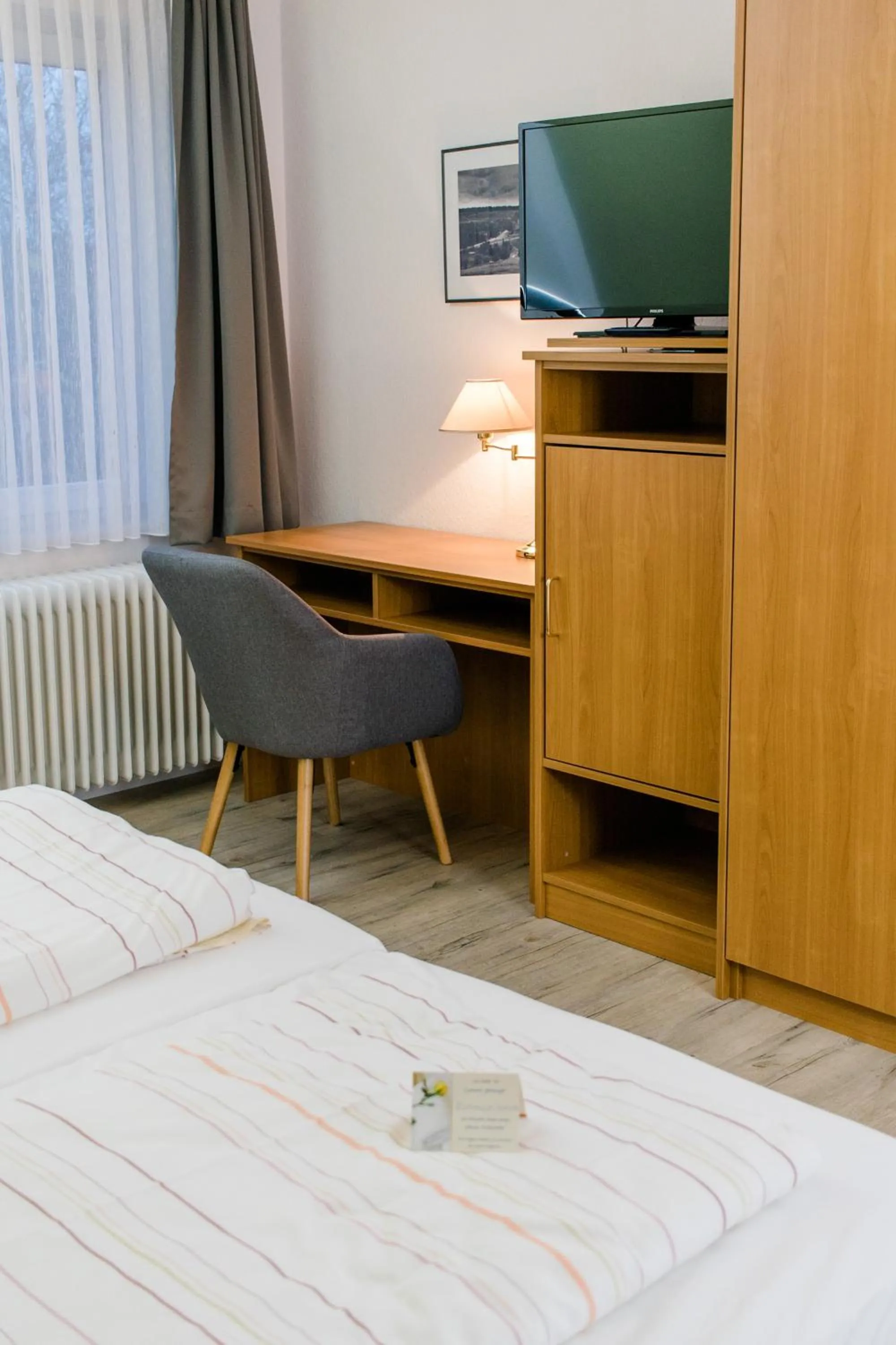 Photo of the whole room, Bed in Akzent Hotel Zur Grünen Eiche