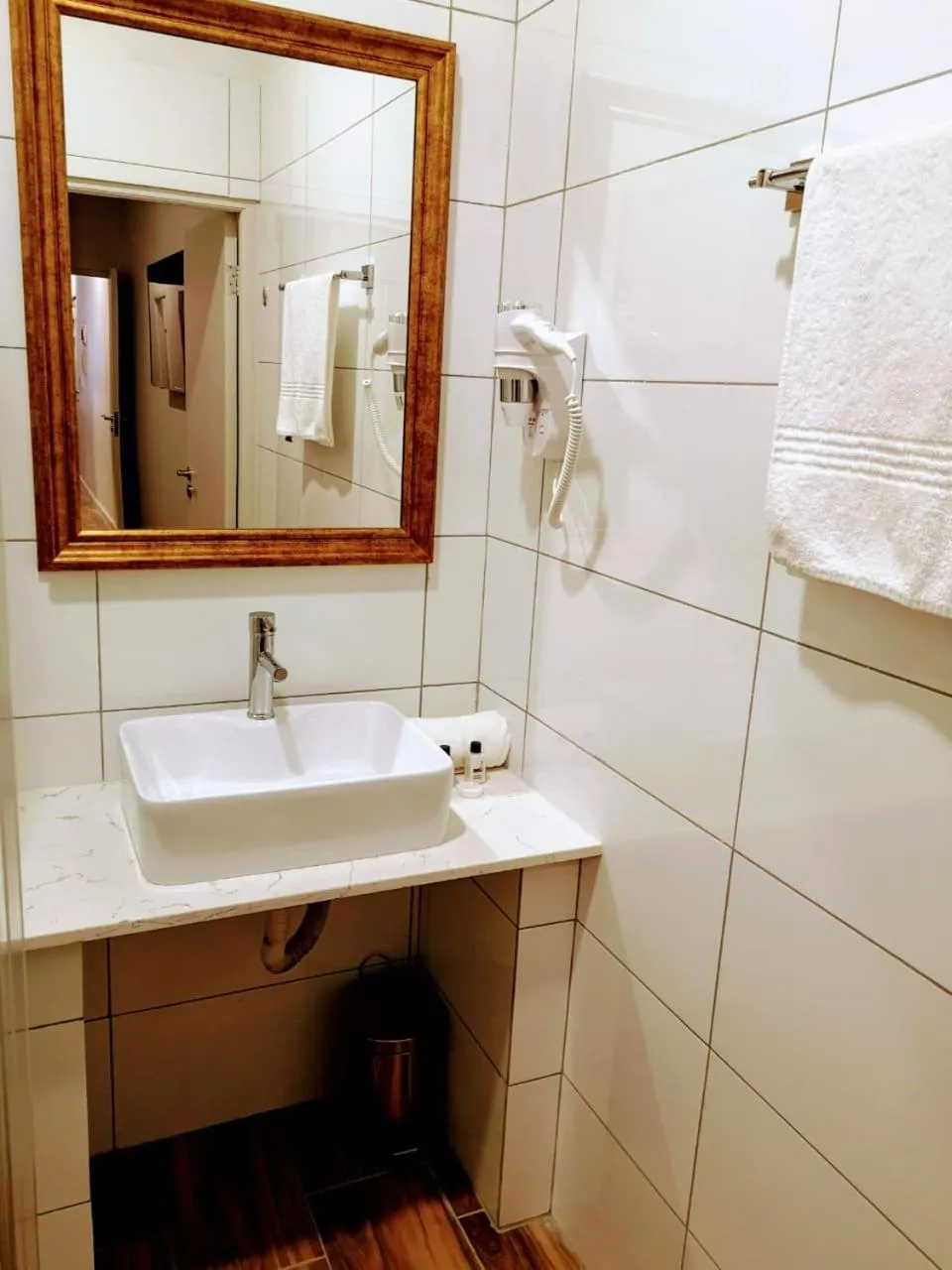 Bathroom in Urban Oasis Aparthotel