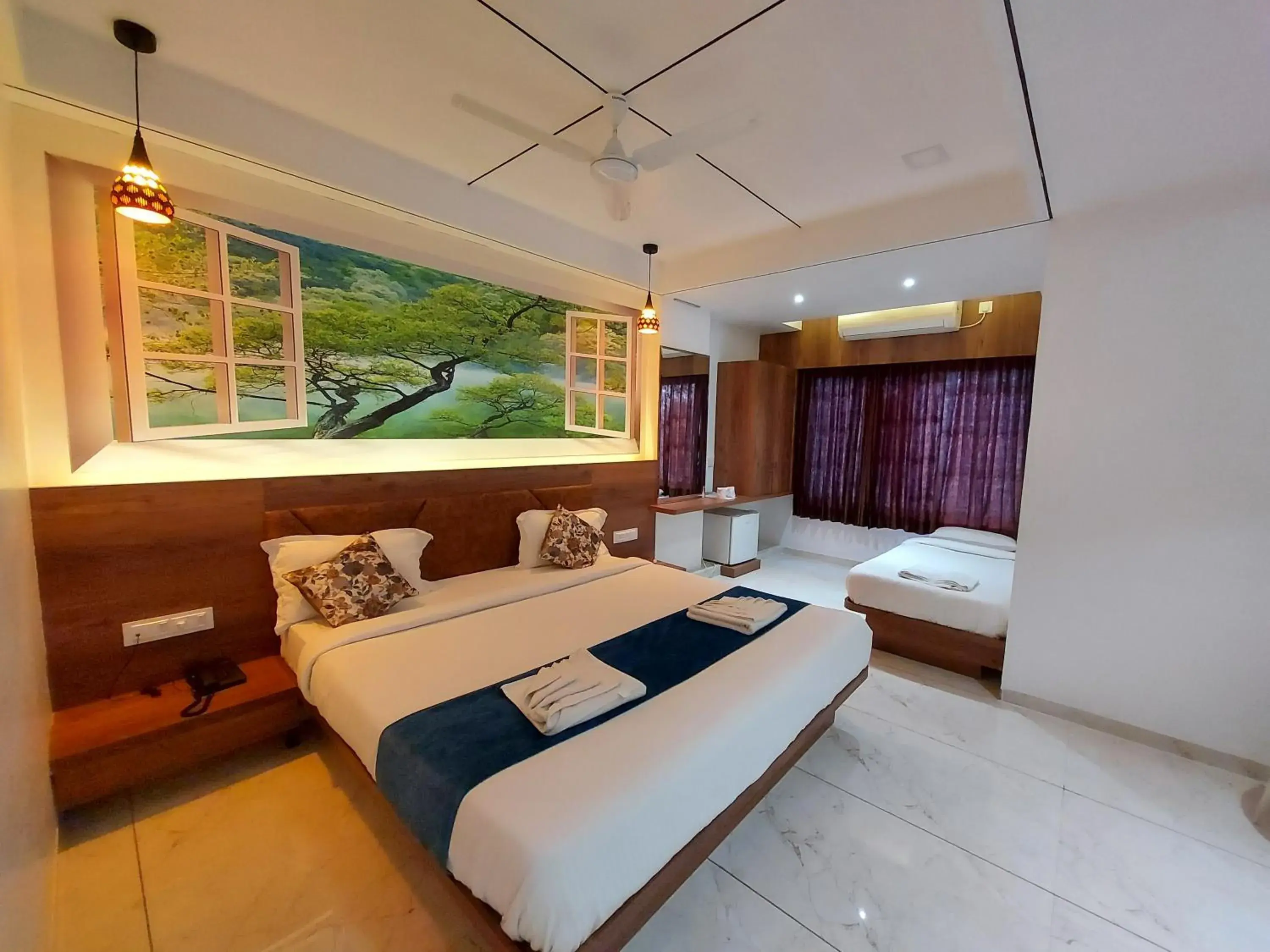 Triple Room with Bathroom - single occupancy in Hotel The Grand Piano - Best Business Hotel in Patan Triple Room with Bathroom - single occupancy in Hotel The Grand Piano - Best Business Hotel in Patan