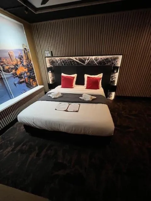 Bed in Hotel The Happy Traveler