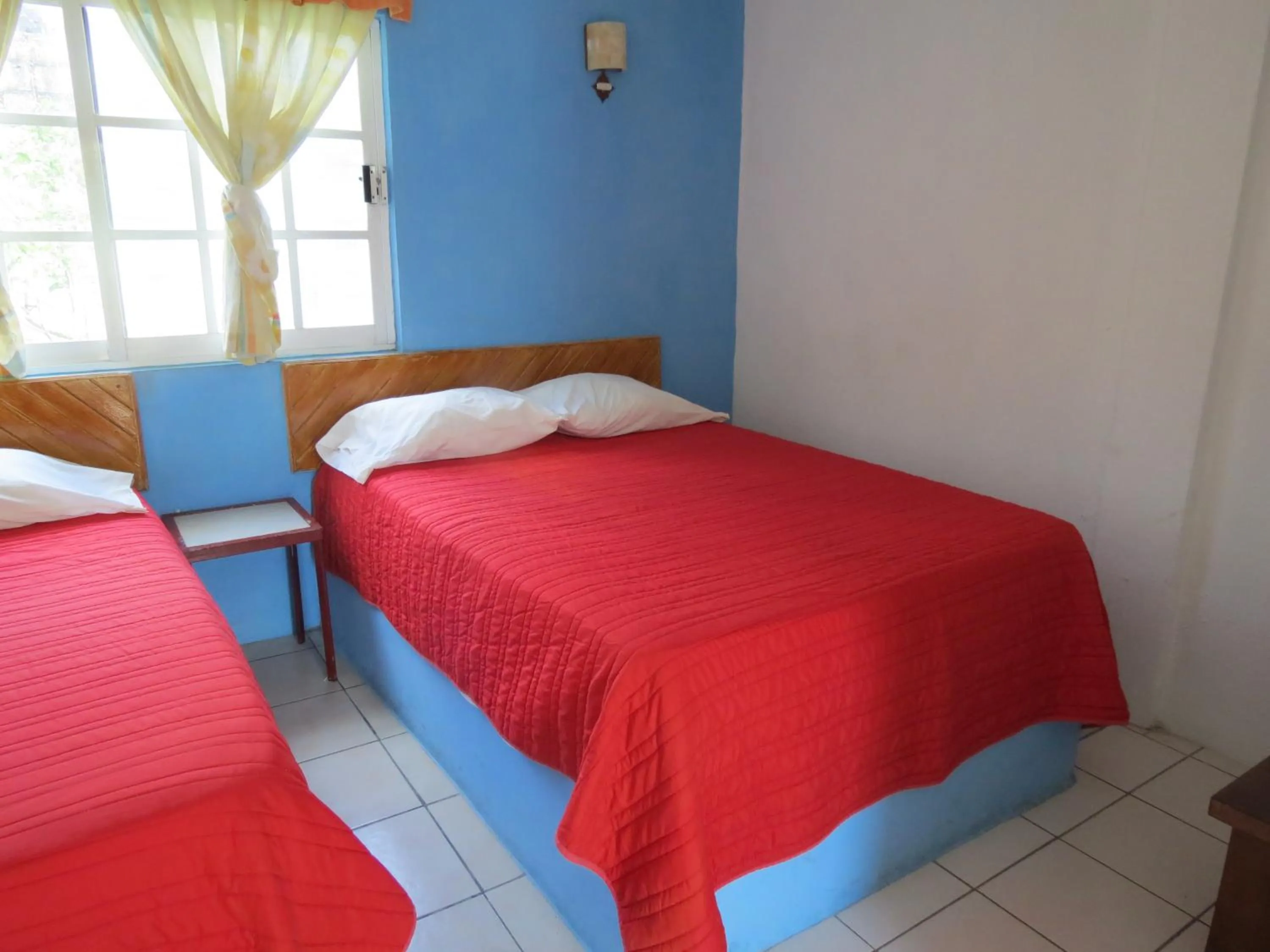 Bed in Hotel Albri by Rotamundos