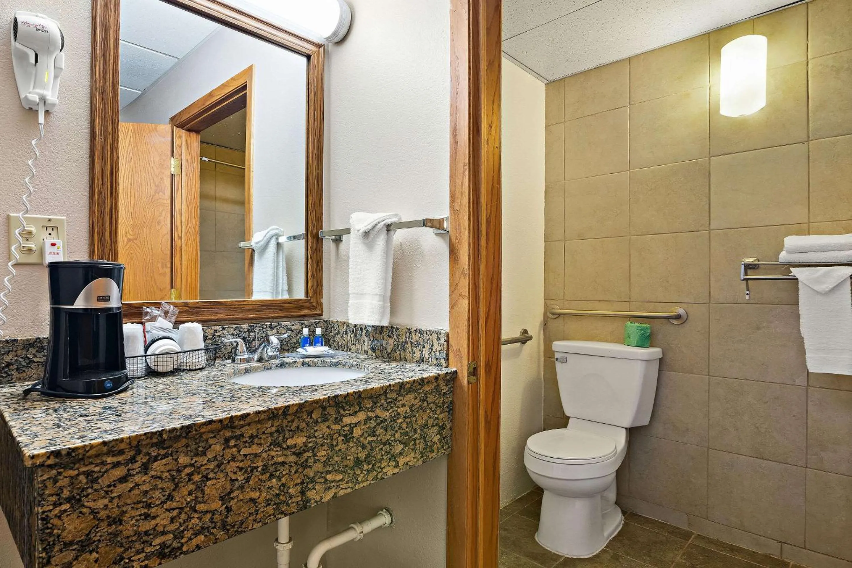 Bedroom in Rodeway Inn McPherson East