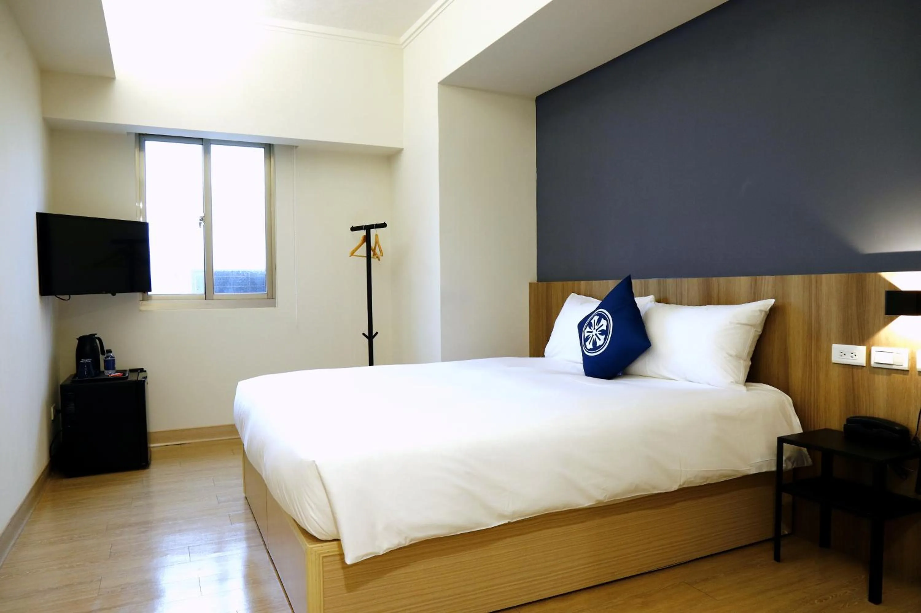 Photo of the whole room, Bed in Holo Hotel Tainan