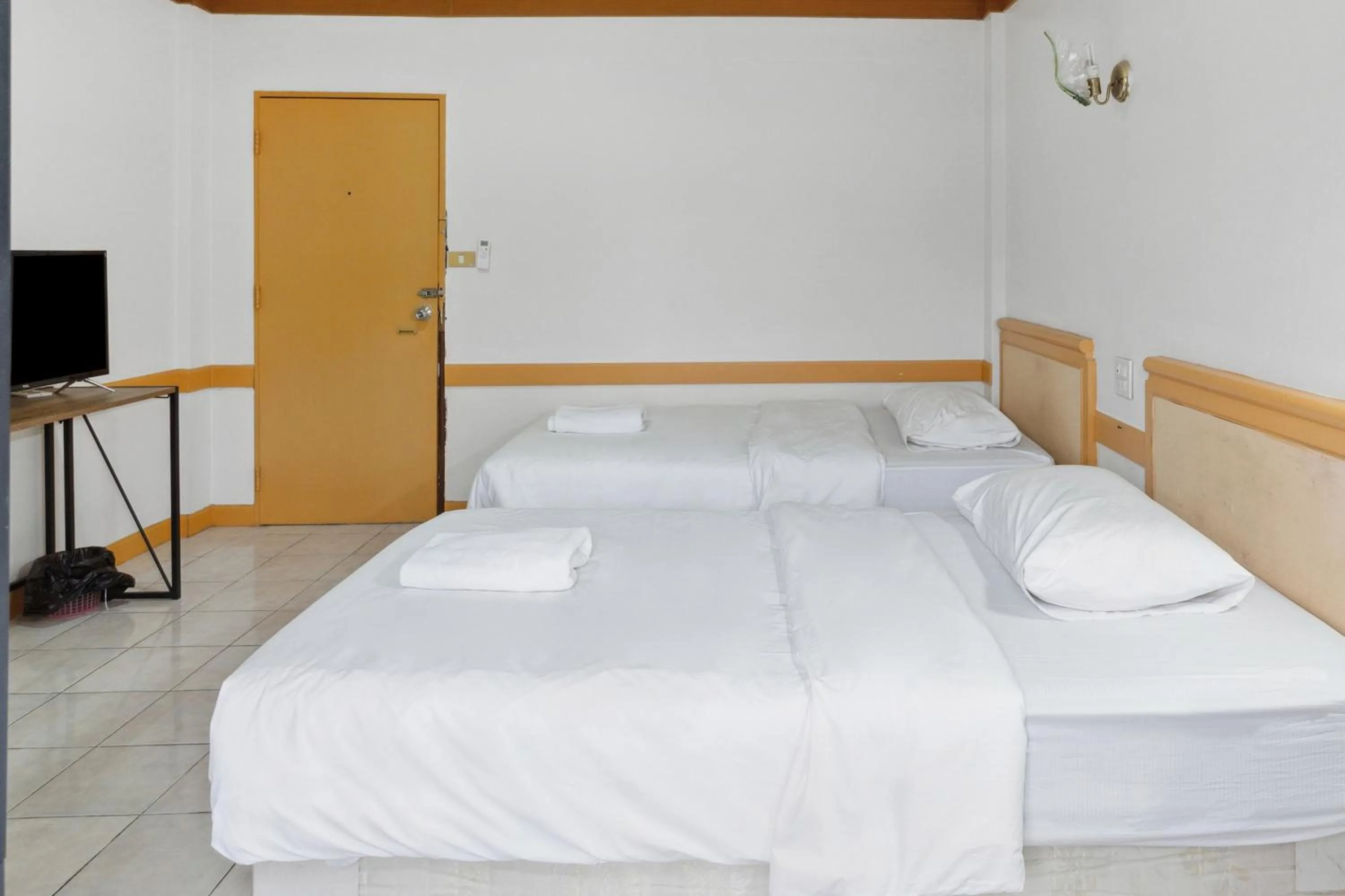 Bed in Phu Inn Hotel