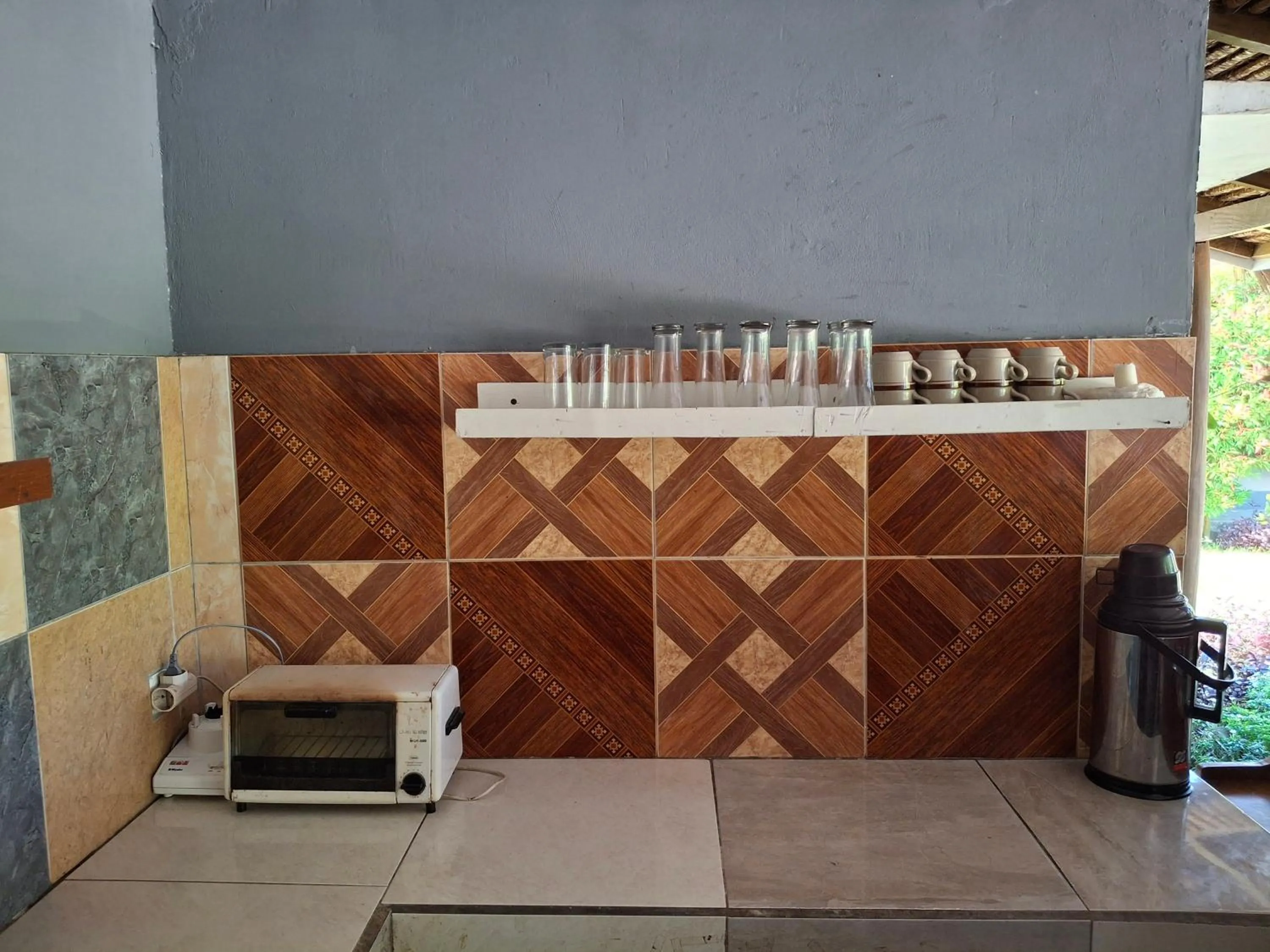 Kitchen or kitchenette in Sammy Cottage Senggigi