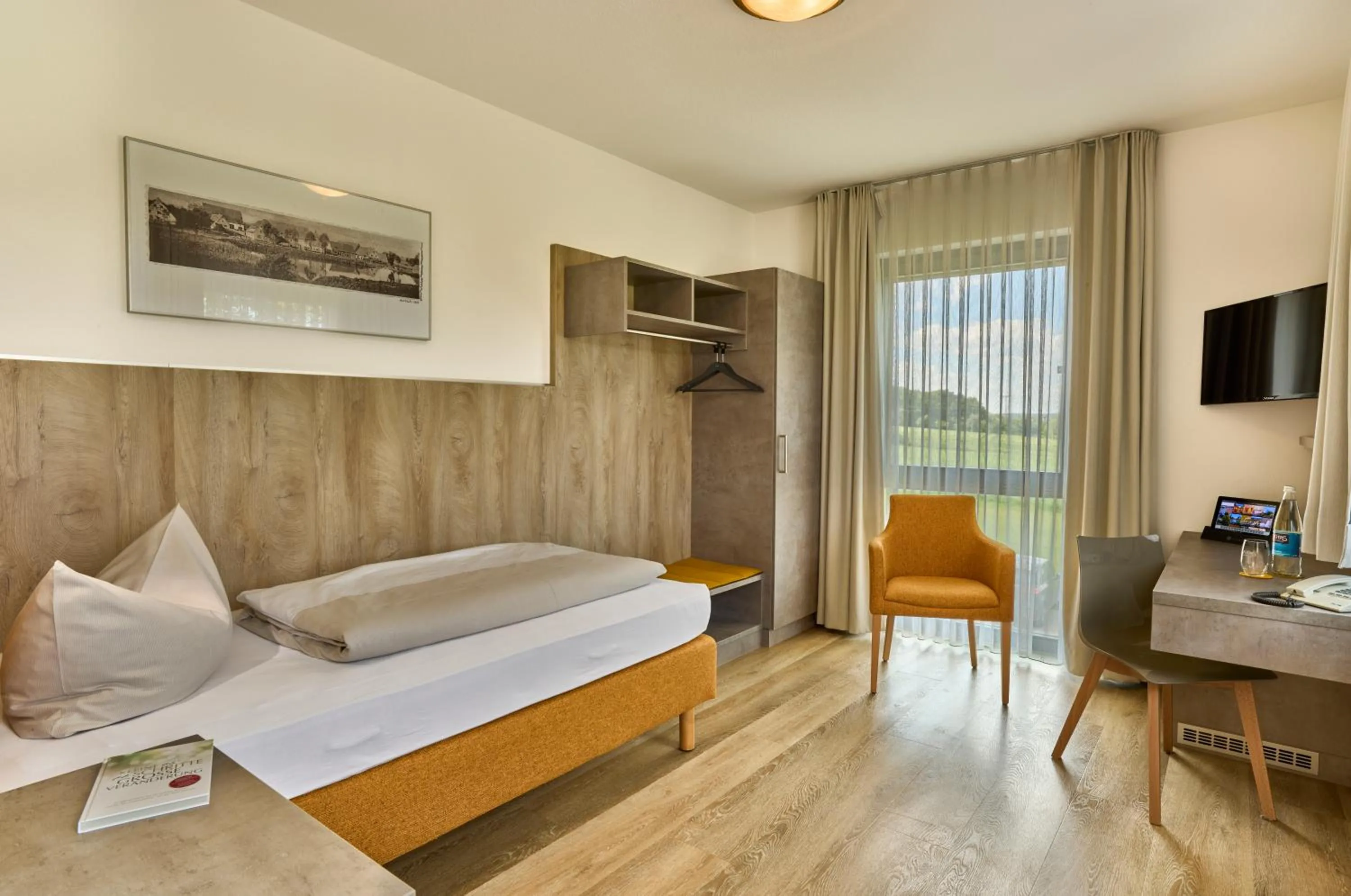 Photo of the whole room, Bed in Landhotel Seerose