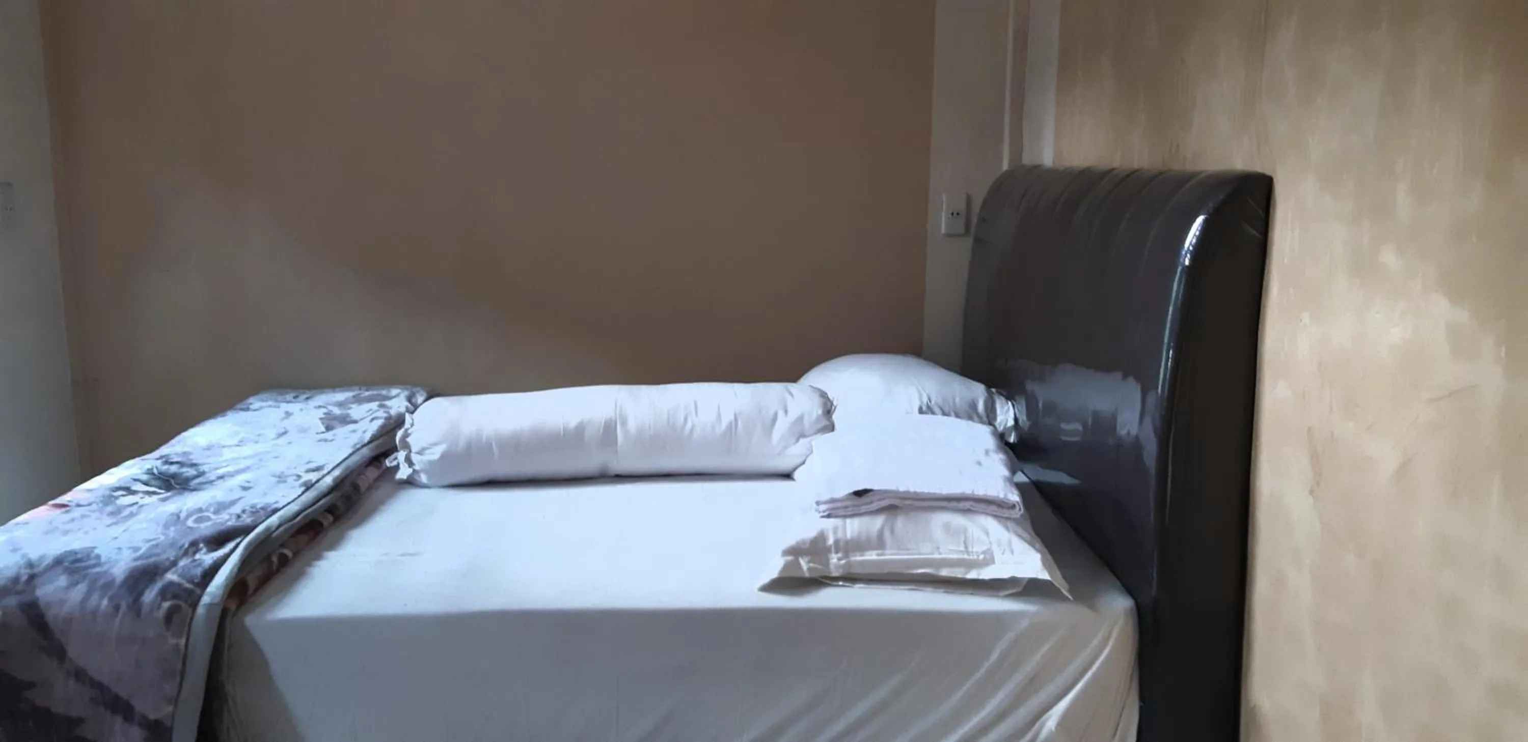 Bed in Airangga Home Stay Syariah Berastagi RedPartner