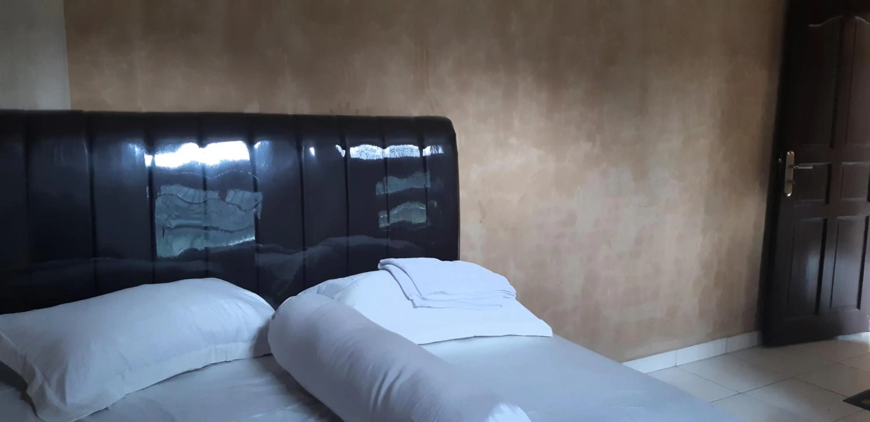 Bed in Airangga Home Stay Syariah Berastagi RedPartner