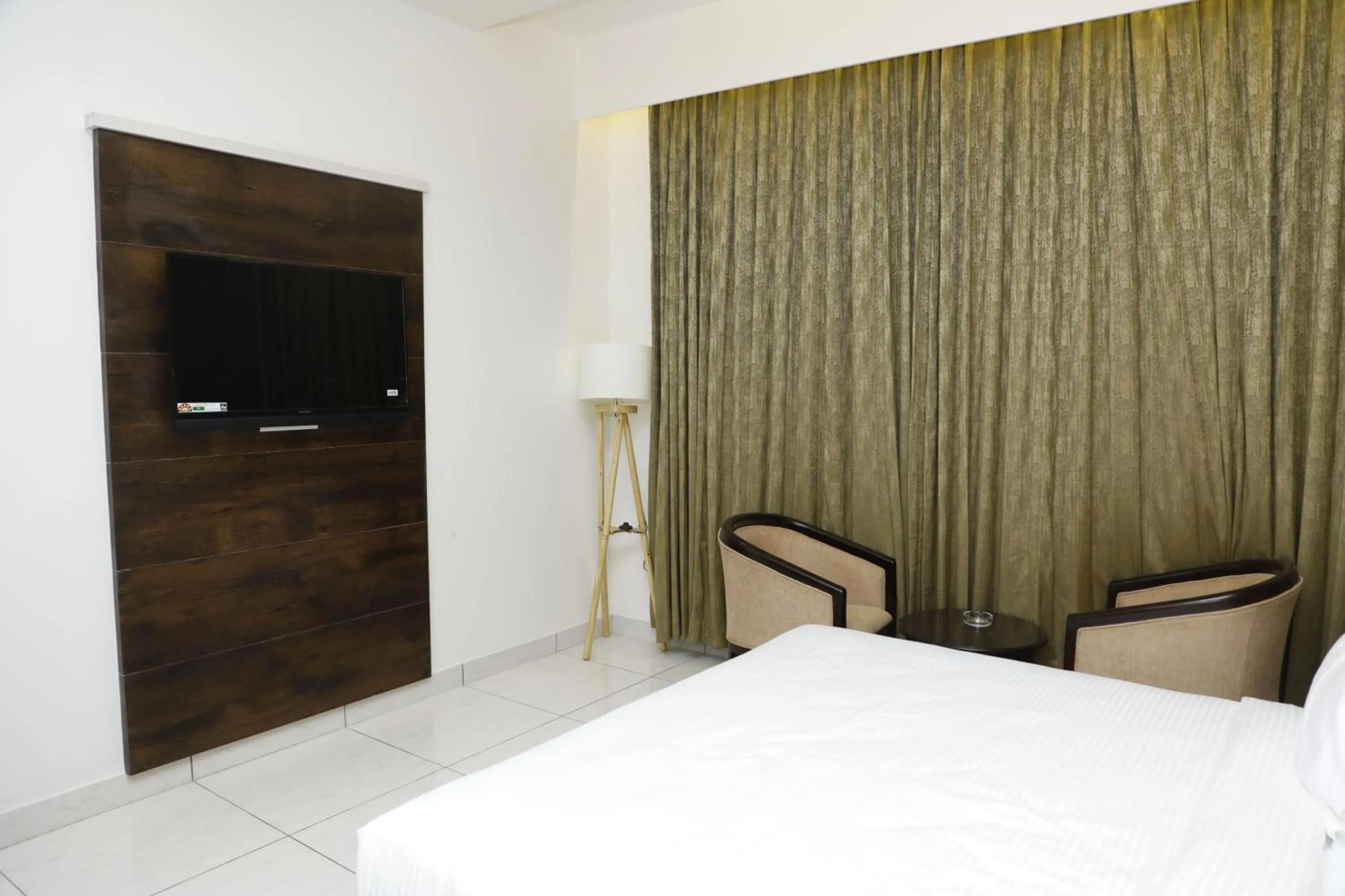 Bed in Hotel Foxglove International