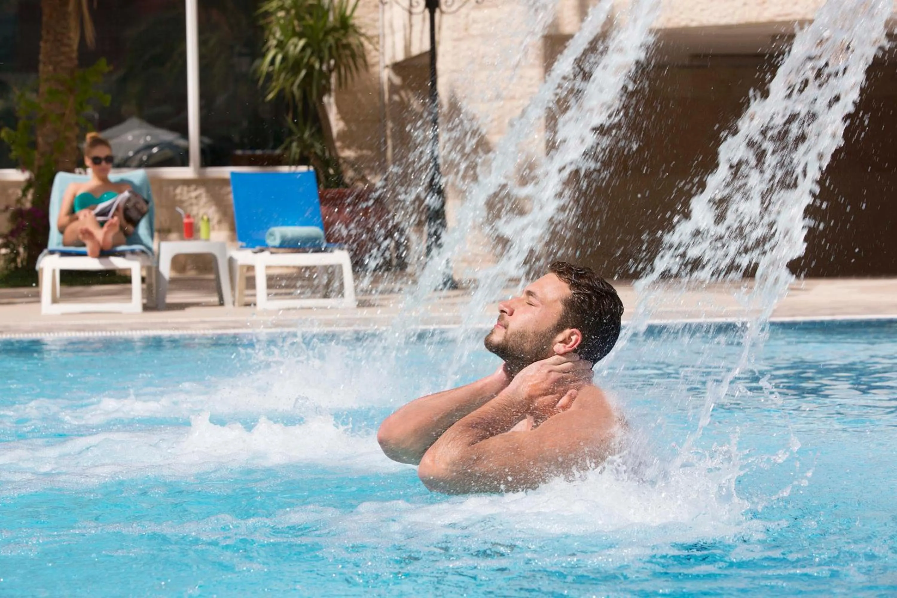 Swimming pool in Crowne Plaza Amman by IHG