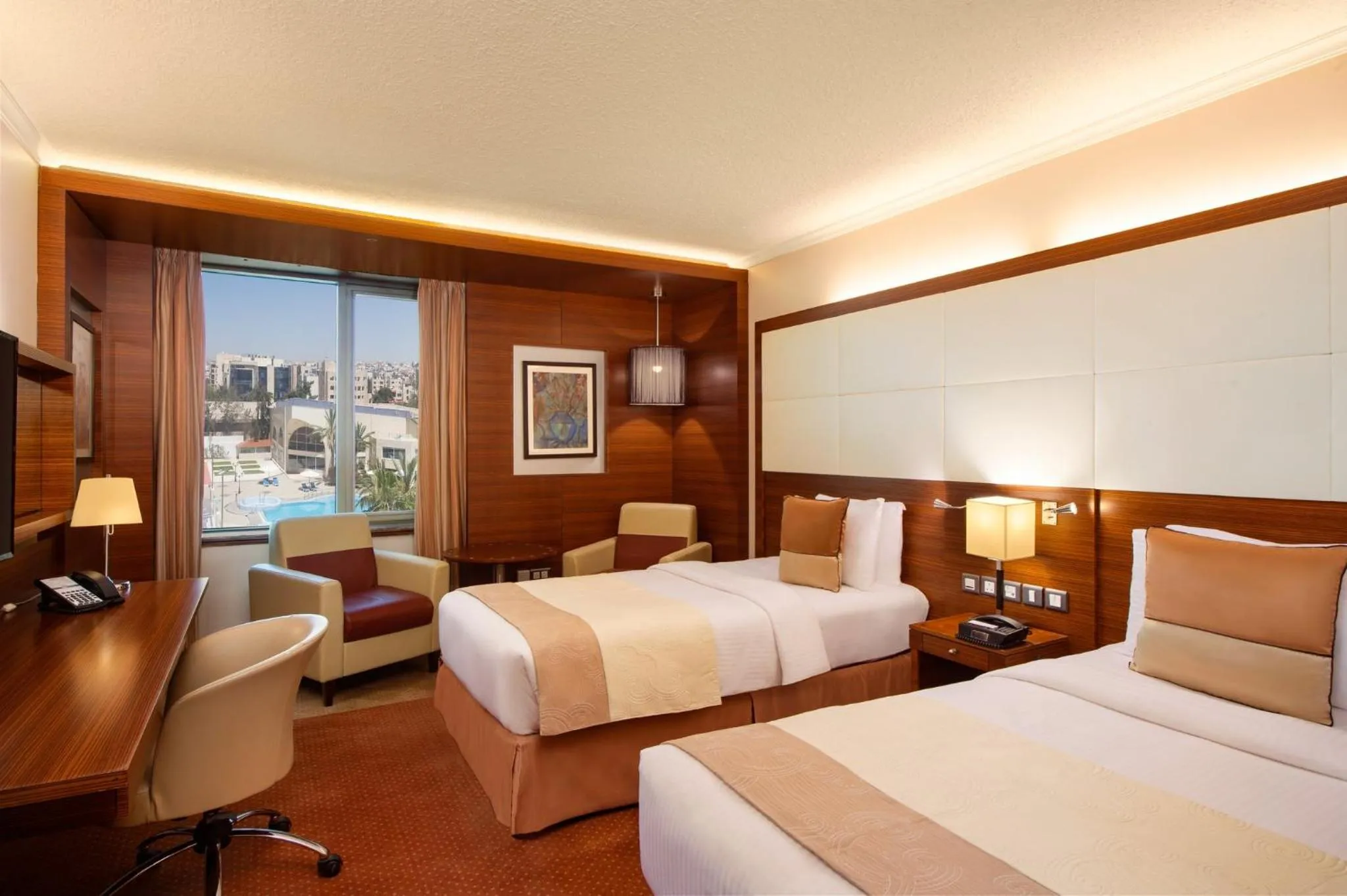 Photo of the whole room, Bed in Crowne Plaza Amman by IHG