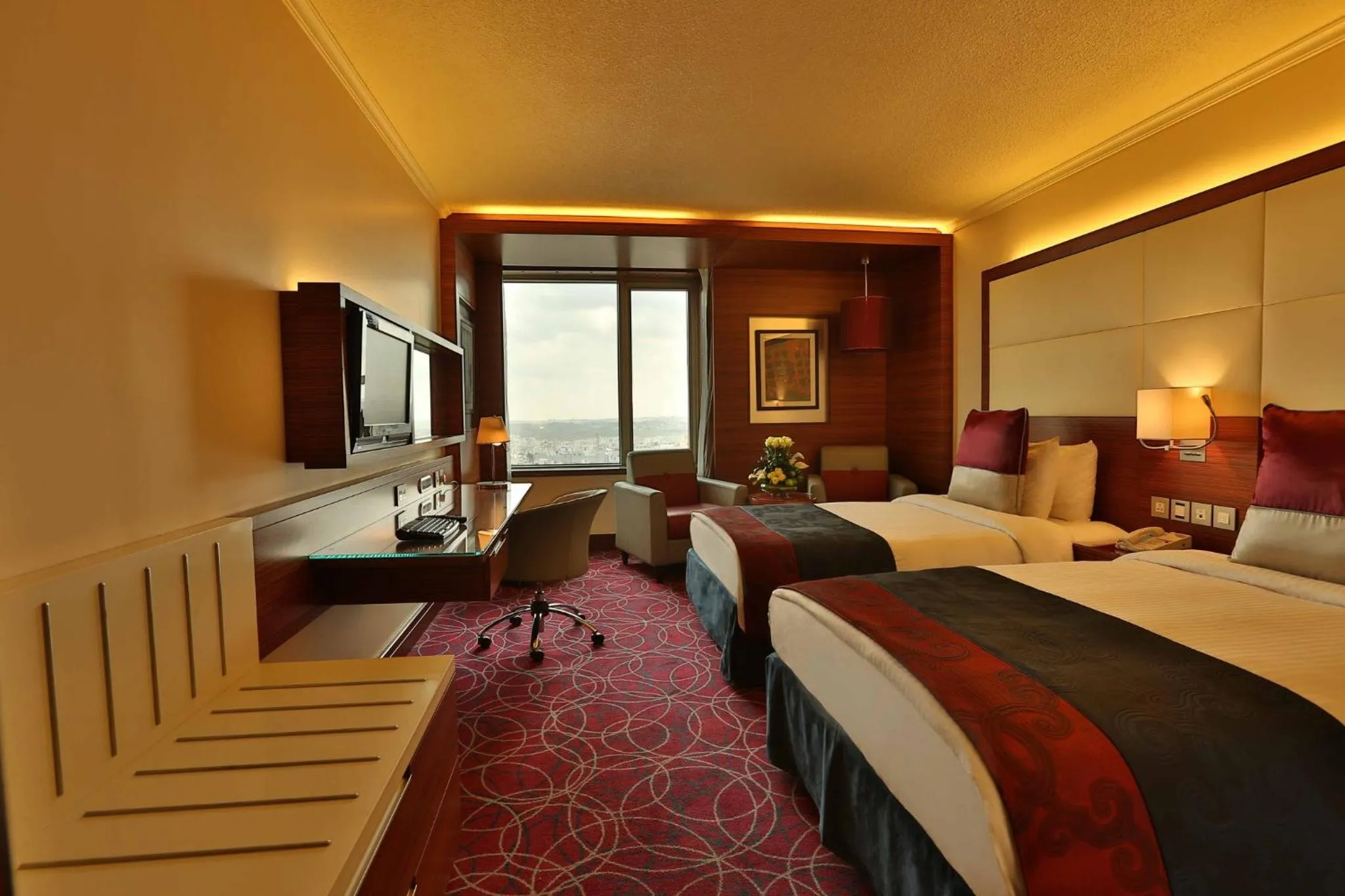 Photo of the whole room, Bed in Crowne Plaza Amman by IHG