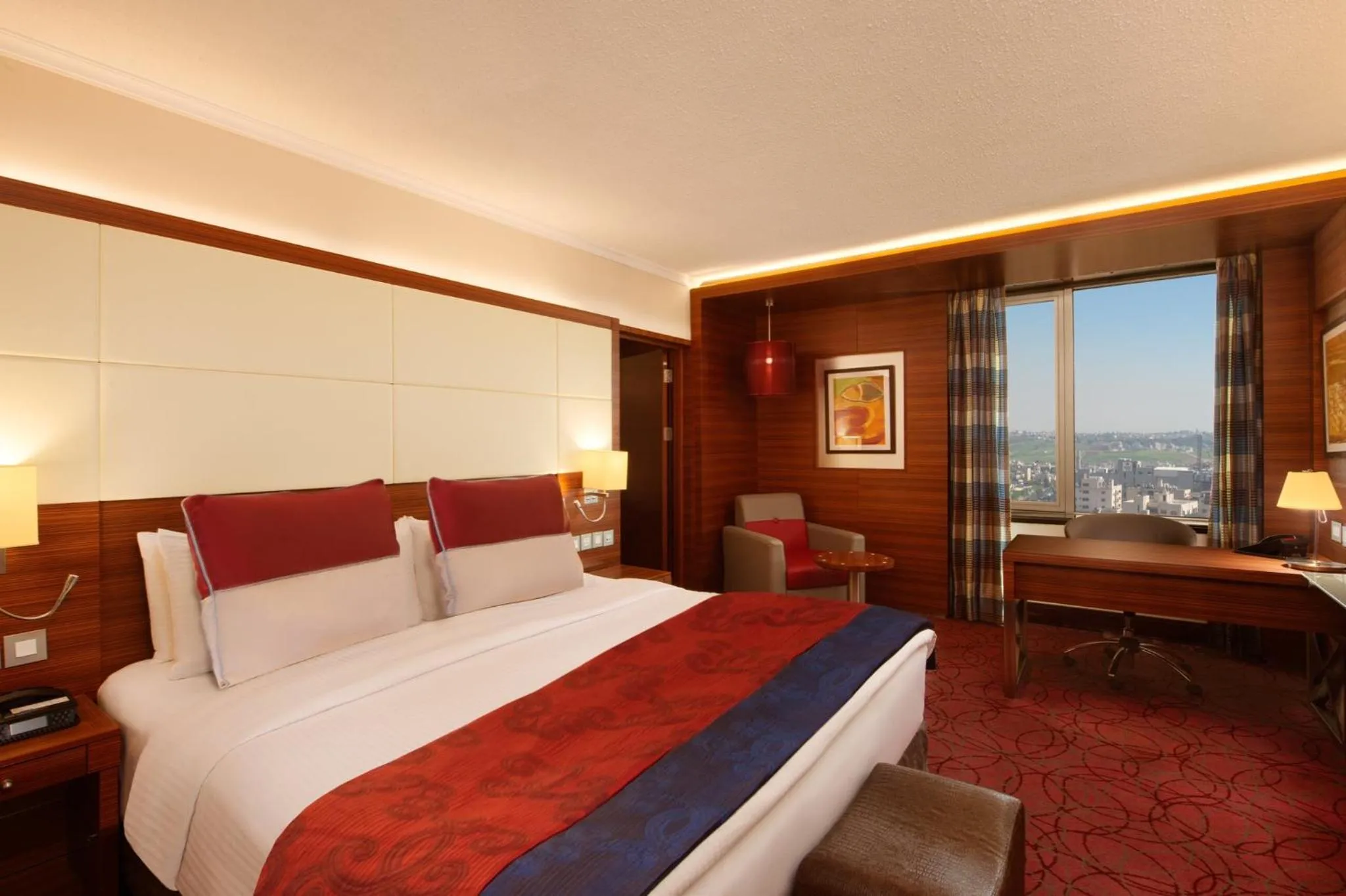 Photo of the whole room, Bed in Crowne Plaza Amman by IHG