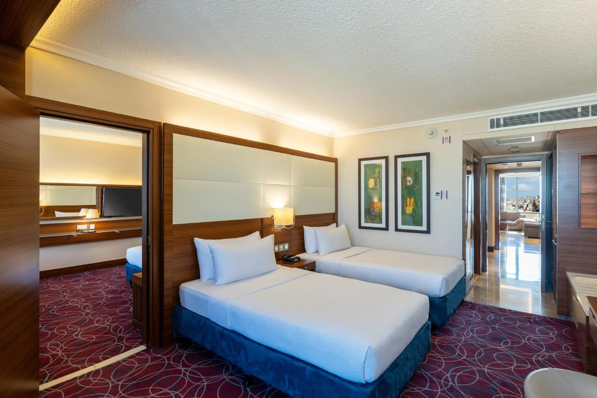 Photo of the whole room, Bed in Crowne Plaza Amman by IHG