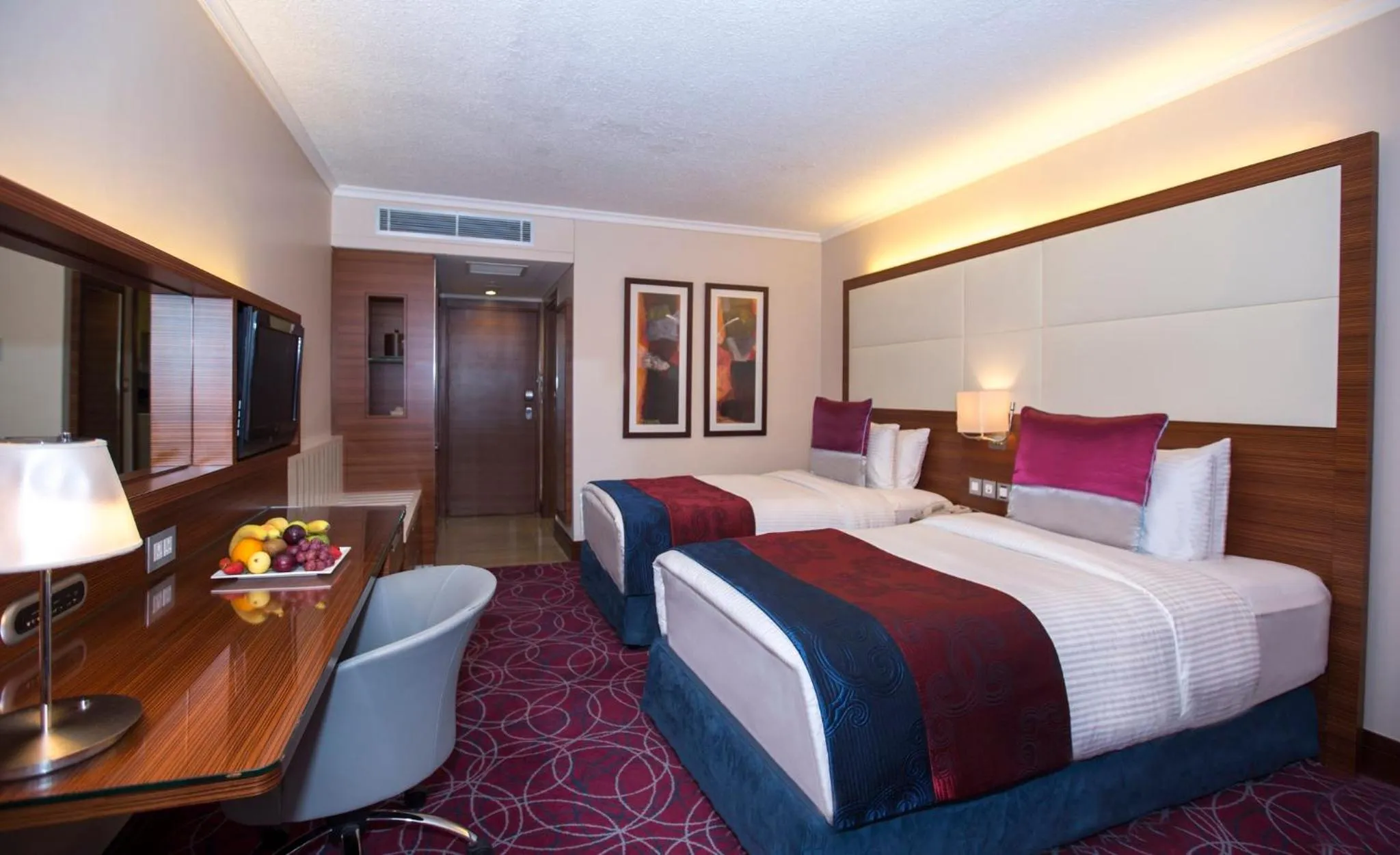 Photo of the whole room, Bed in Crowne Plaza Amman by IHG