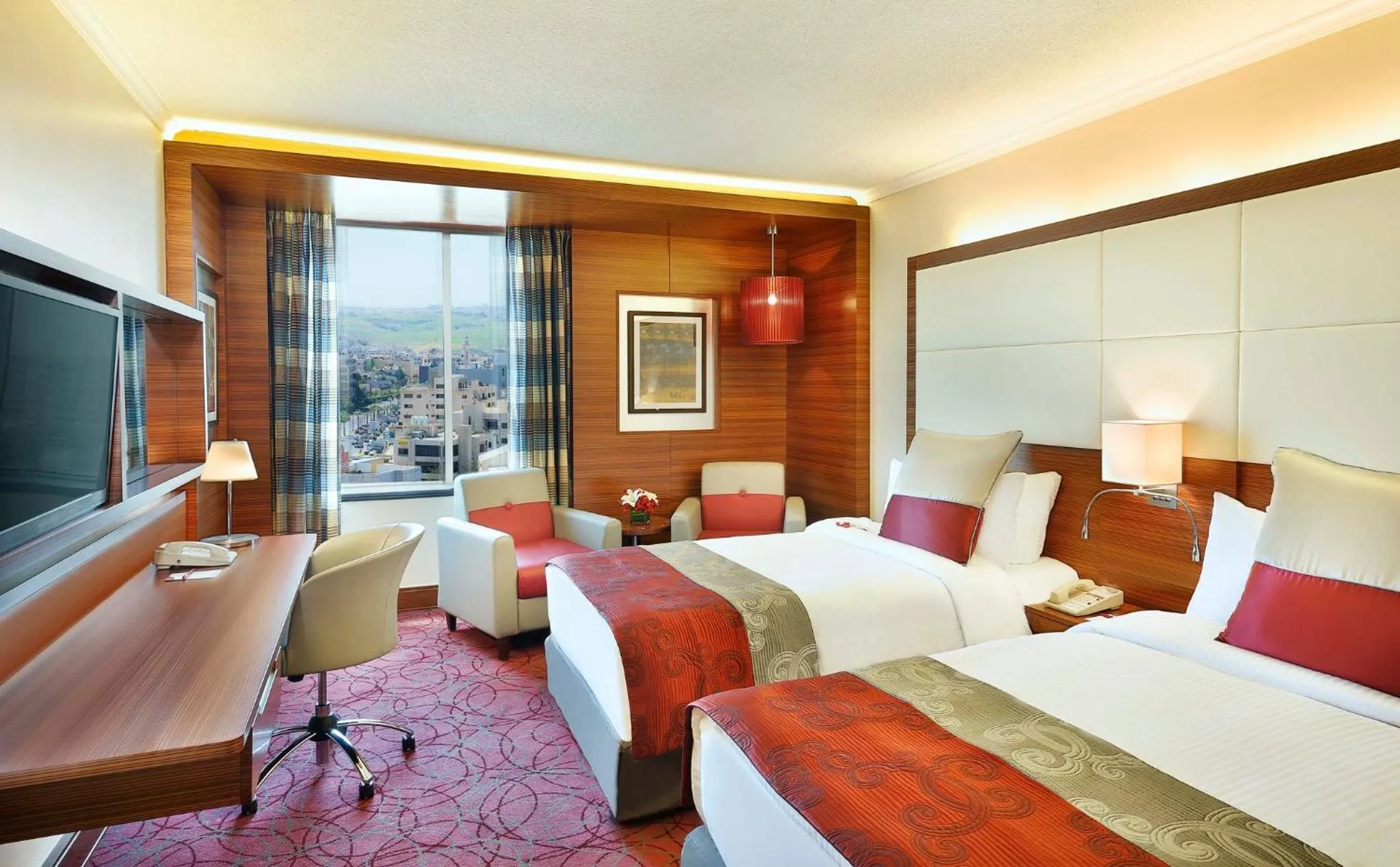 Photo of the whole room, Bed in Crowne Plaza Amman by IHG