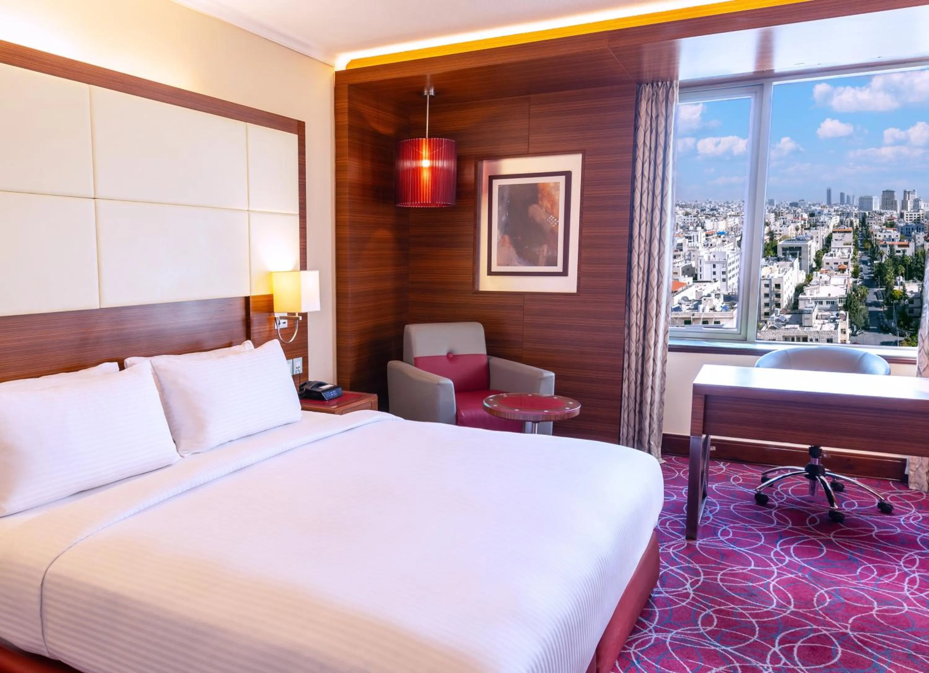 Photo of the whole room, Bed in Crowne Plaza Amman by IHG