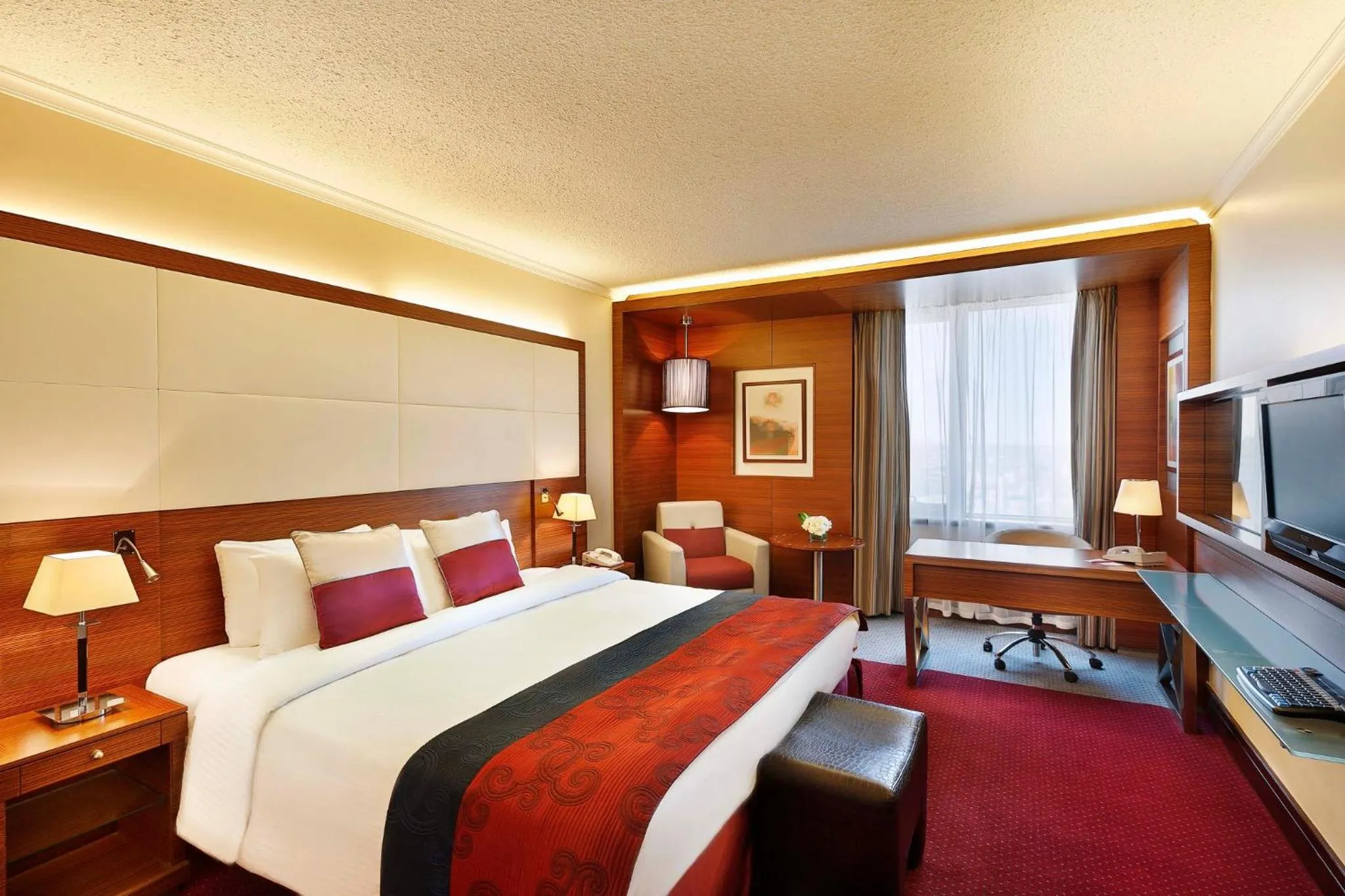 Photo of the whole room, Bed in Crowne Plaza Amman by IHG