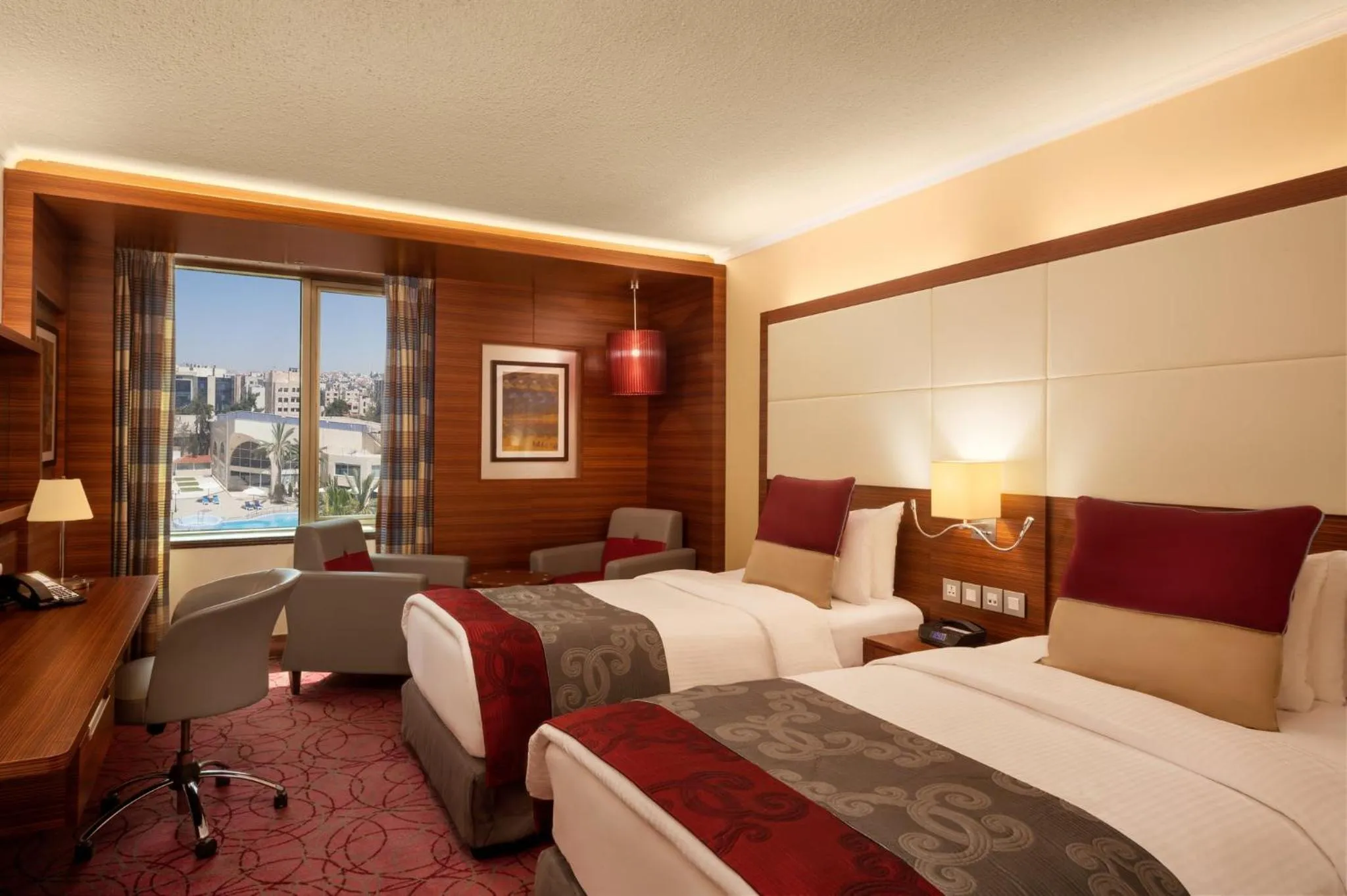 Photo of the whole room, Bed in Crowne Plaza Amman by IHG