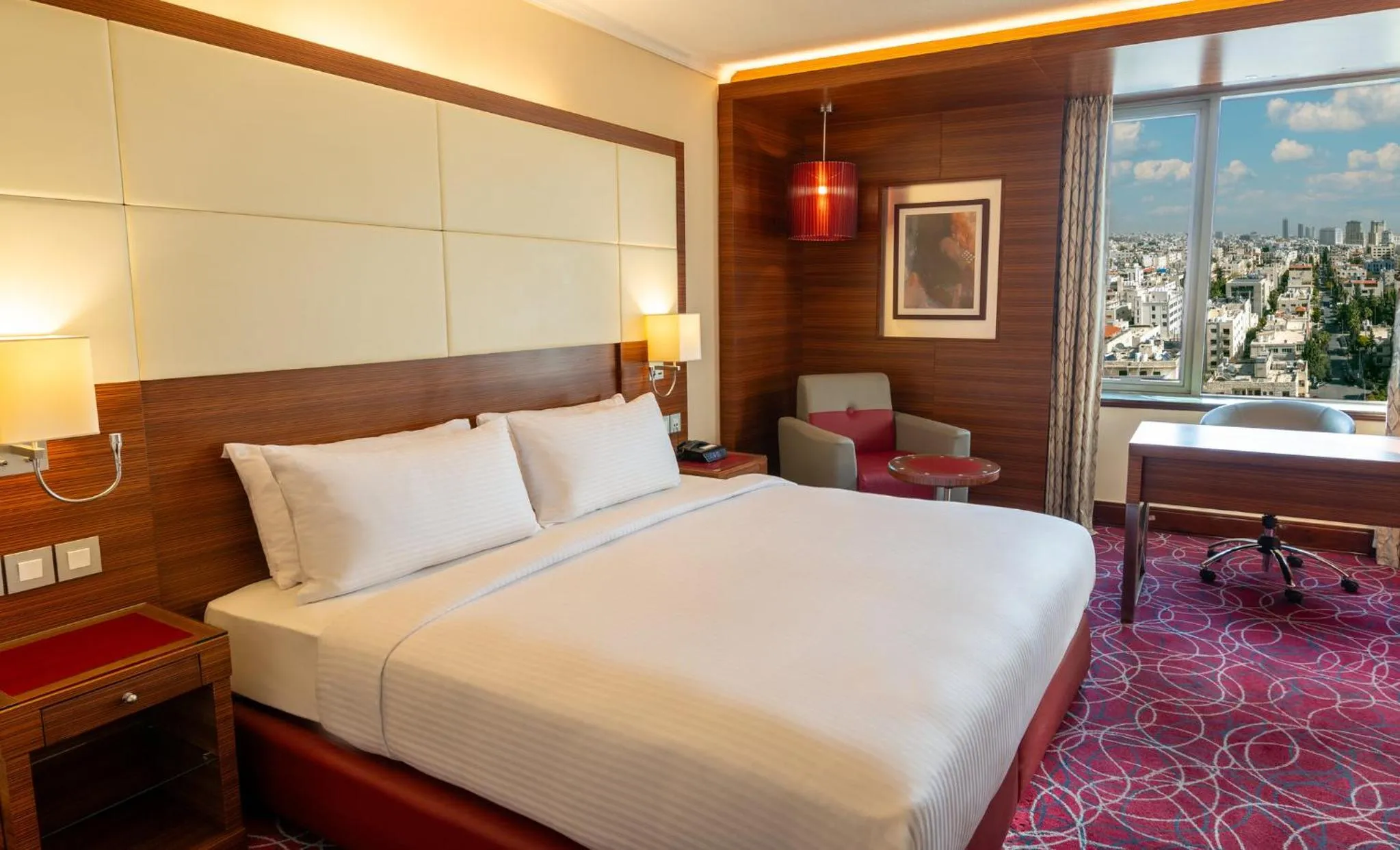 Photo of the whole room, Bed in Crowne Plaza Amman by IHG