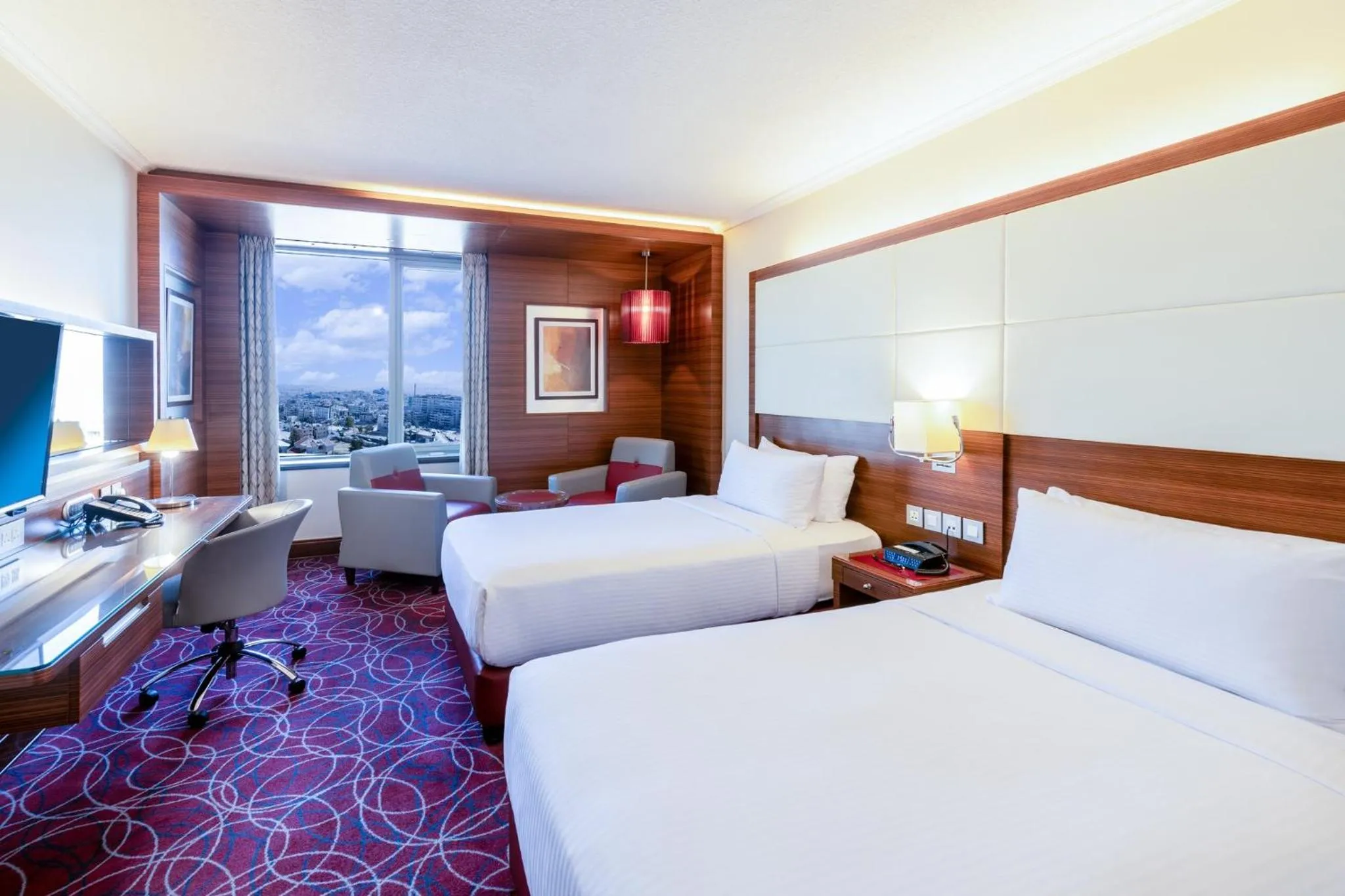 Photo of the whole room, Bed in Crowne Plaza Amman by IHG